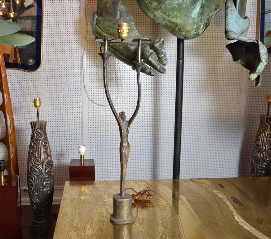 Rare and beautiful bronze table lamp by Felix Agostini.