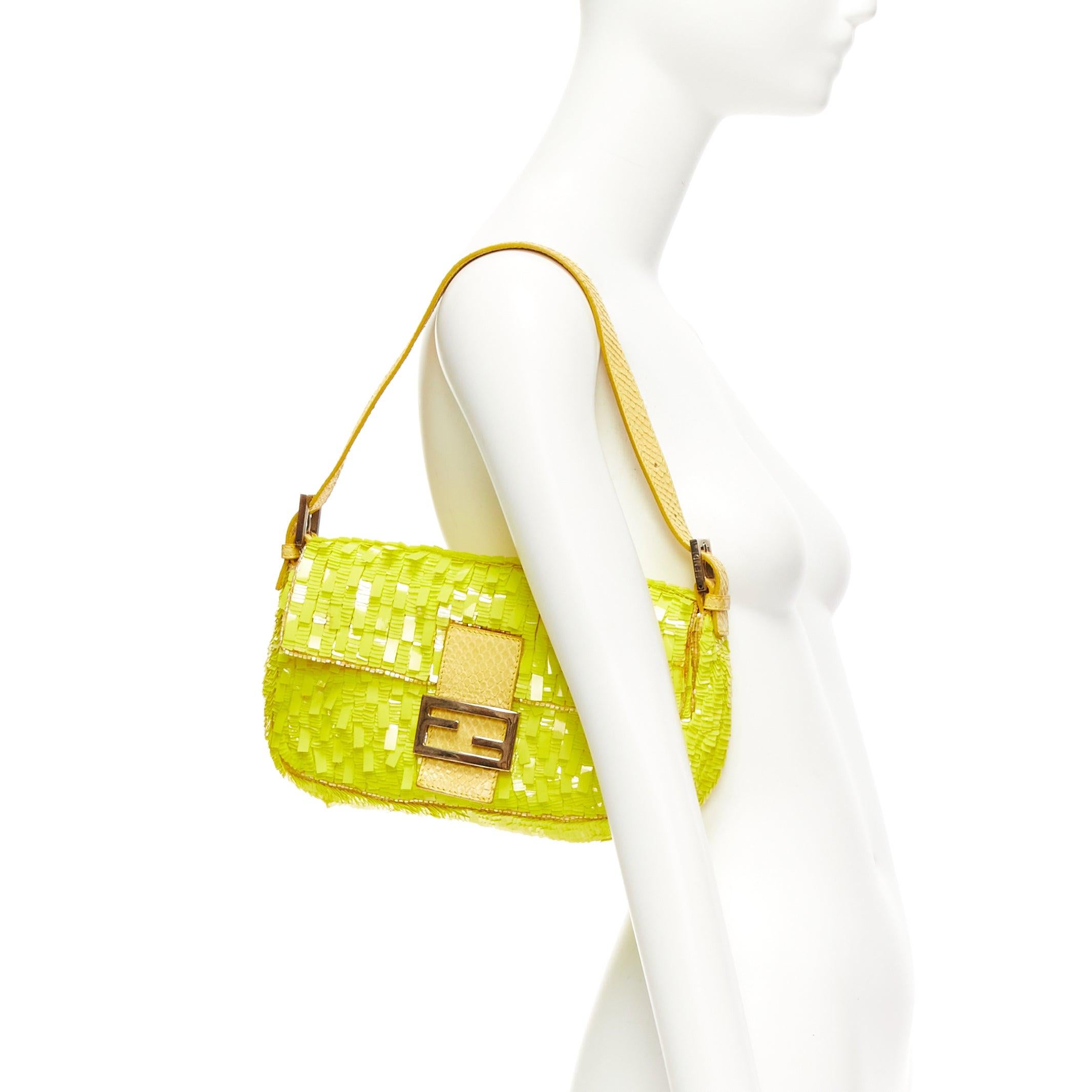 rare FENDI Baguette neon yellow sequin scaled leather FF buckle shoulder bag
Reference: TGAS/E00047
Brand: Fendi
Model: Baguette
Material: Leather, Plastic
Color: Yellow
Pattern: Sequins
Closure: Magnet
Lining: Yellow Fabric
Extra Details: