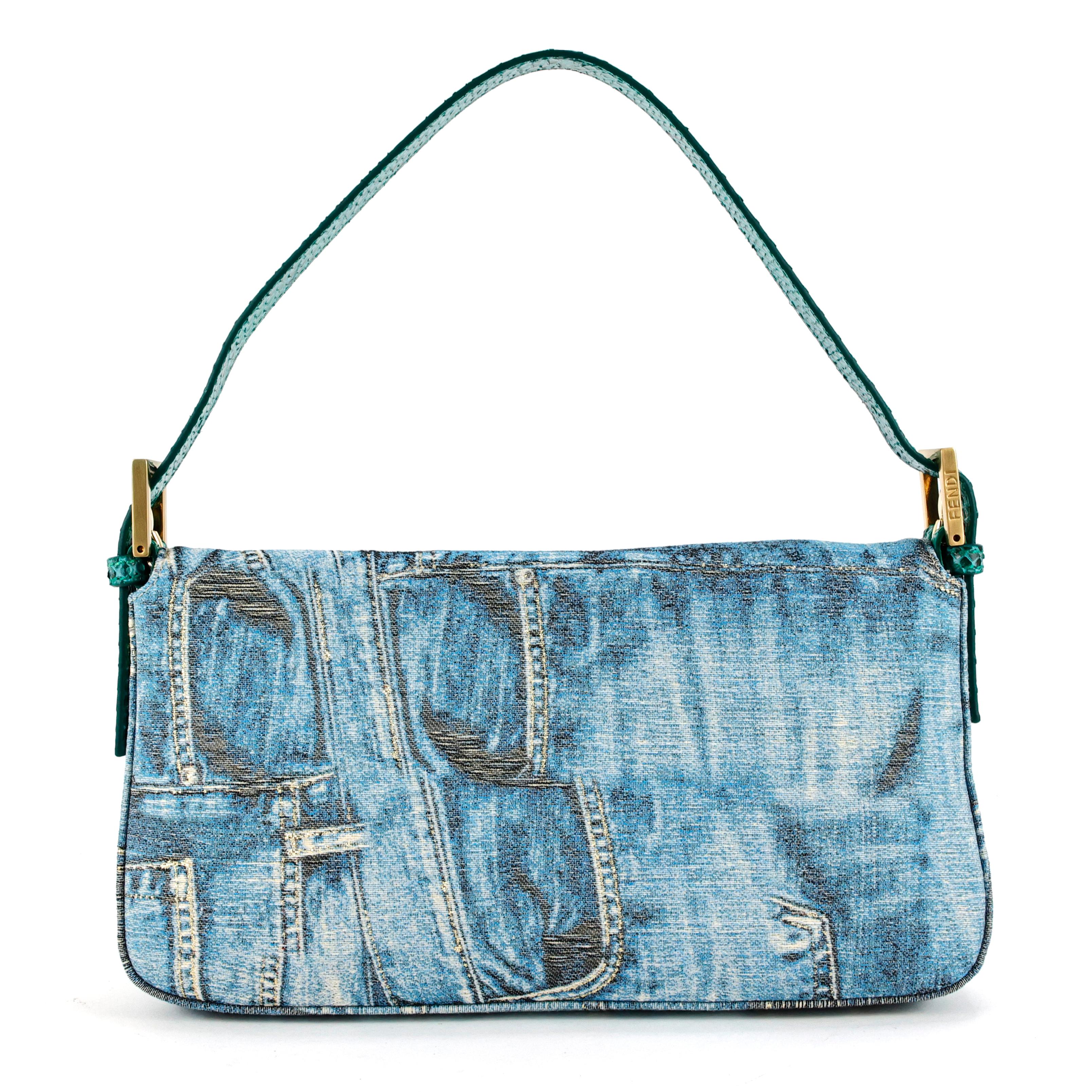 Fendi denim/jeans print lurex baguette with details in turquoise snake leather, gold hardware, double F clasp embellished with a natural stone. This  bag was featured in the Baguettemania exhibition celebrating 15 years Baguette at Colette Paris and