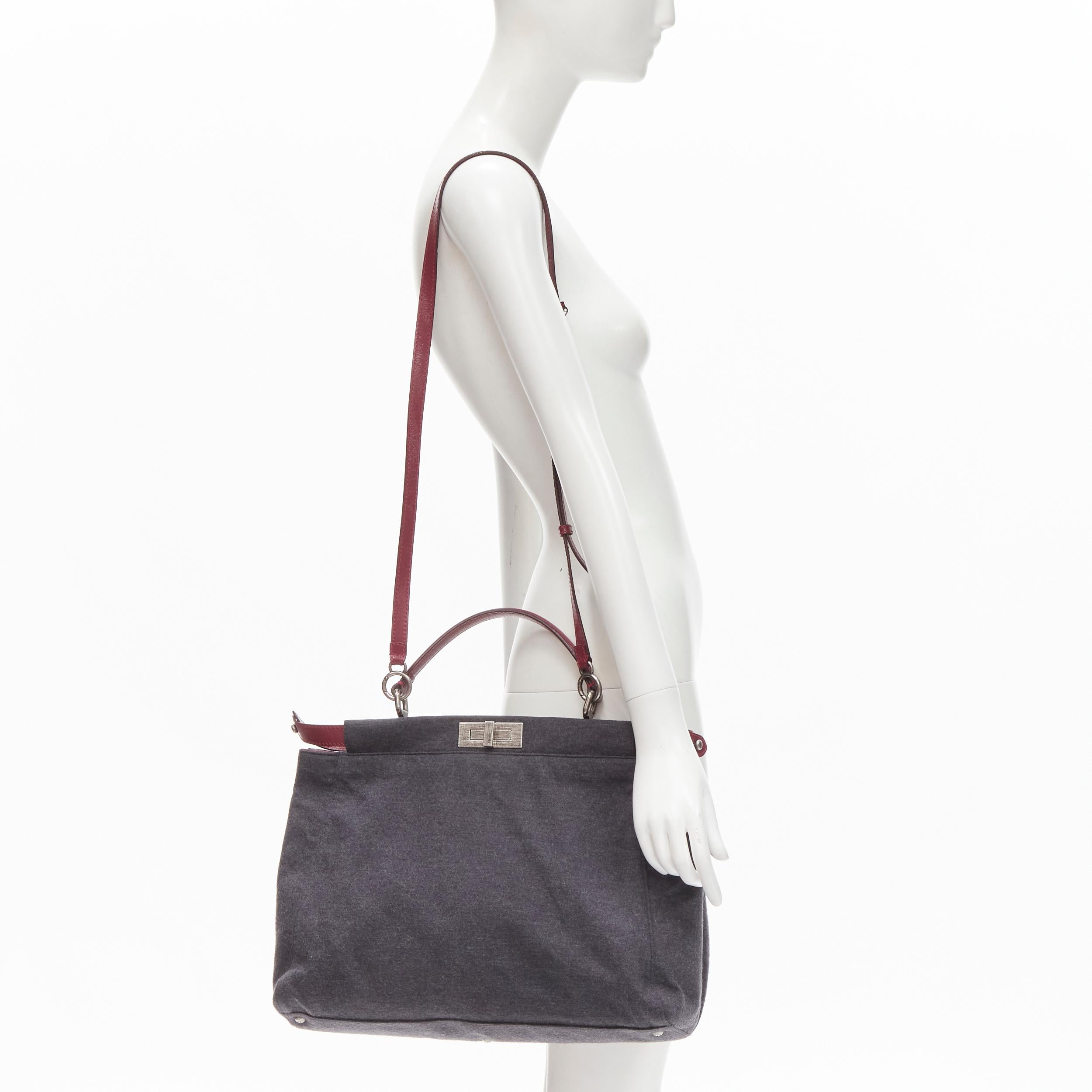 rare FENDI Peekaboo grey wool burgundy textured leather shoulder satchel bag 
Reference: JACG/A00001 
Brand: Fendi 
Model: Peekaboo 
Material: Wool 
Color: Grey 
Pattern: Solid 
Closure: Turnlock 
Extra Detail: Antique brushed silver-tone hardware.