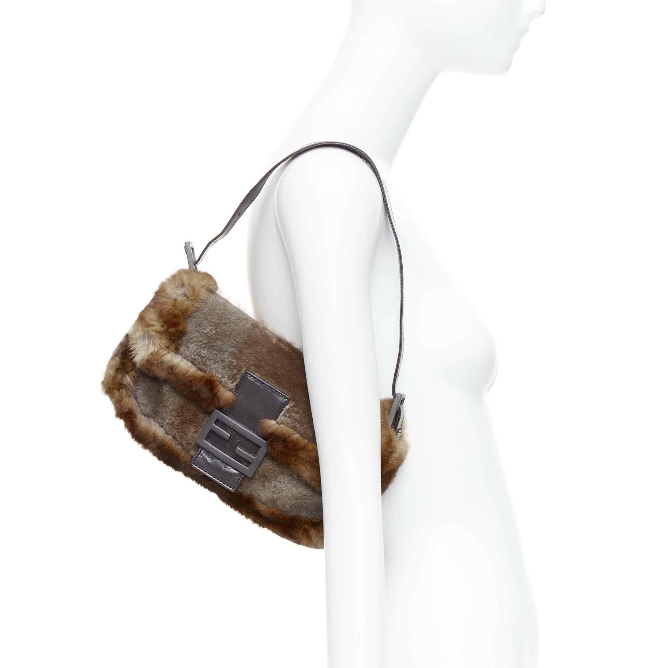 rare FENDI Vintage Baguette brown shaved rabbit fur FF logo underarm bag
Reference: TGAS/E00205
Brand: Fendi
Model: Baguette
Material: Fur, Leather
Color: Brown
Pattern: Solid
Closure: Magnet
Lining: Black Fabric
Made in: