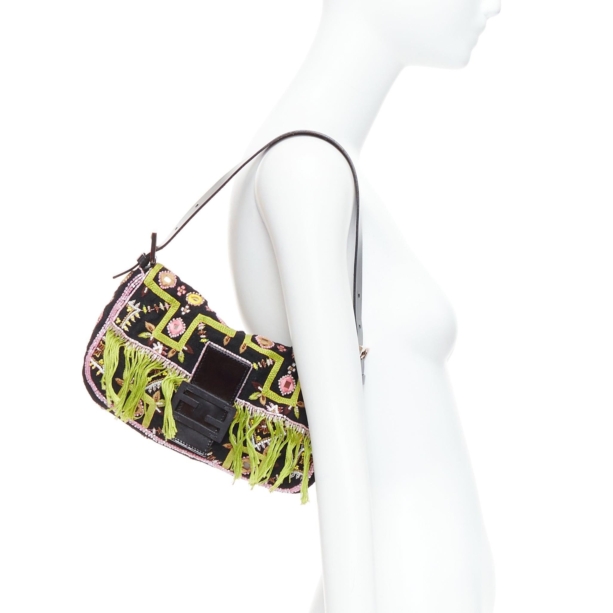 rare FENDI Vintage Baguette green fringe embroidered FF underarm bag
Reference: TGAS/E00206
Brand: Fendi
Model: Baguette
Material: Fabric, Leather
Color: Green, Multicolour
Pattern: Ethnic
Closure: Magnet
Lining: Green Fabric
Extra Details: Similar