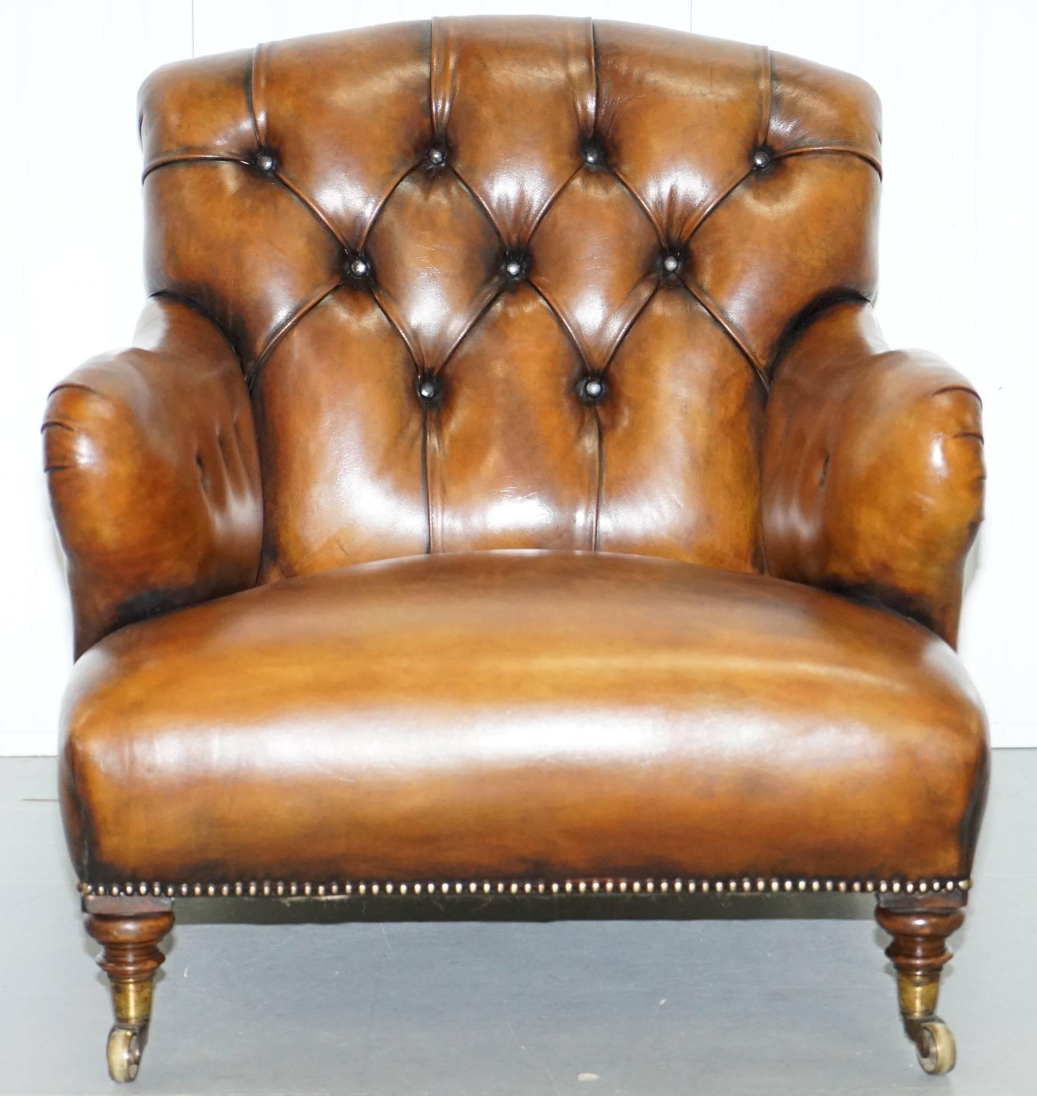 We are delighted to offer for sale this stunning exceptionally rare original early Victorian walnut framed Howard & Son’s Berners street tobacco brown leather armchair

I have a Howard and Son's sofa listed under my other items that have just been