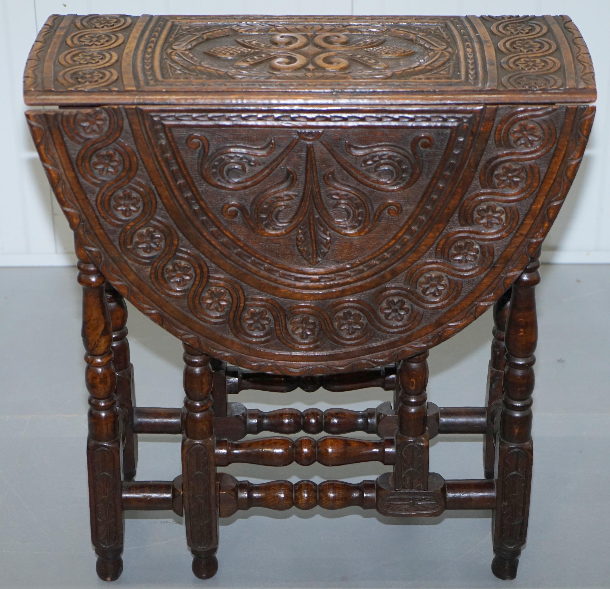 We are delighted to offer for sale this lovely little Georgian hand-carved in the Jacobean manor folding gateleg table

A good looking and well-made table, the carving was most likely added in the Victorian era, much as was the fashion in this