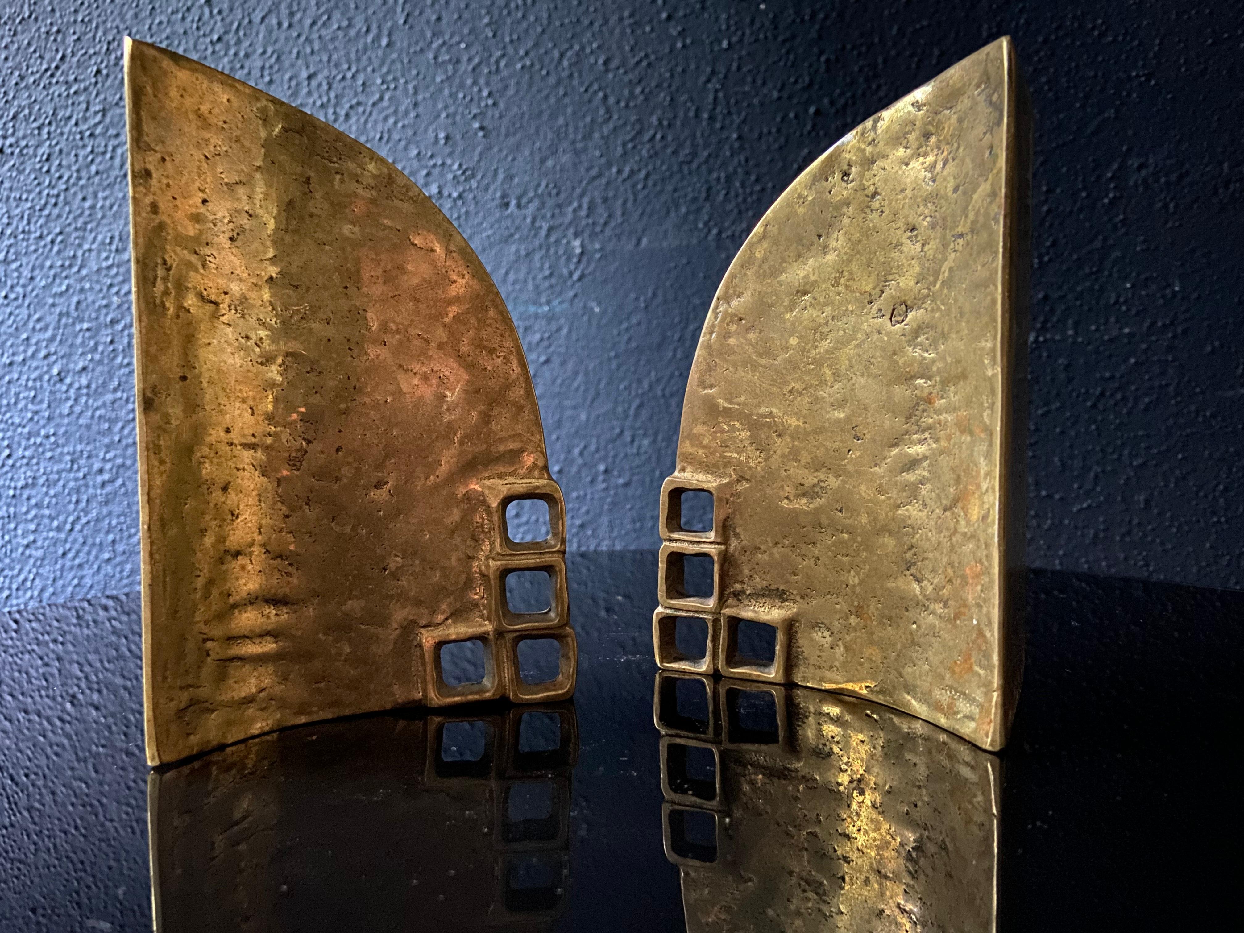 This pair of sculptural bookends truly is a rare find!

Designed by Hannes Heinz Goll, the Austrian enfant terrible of the 60's art scene and co-founder of the 