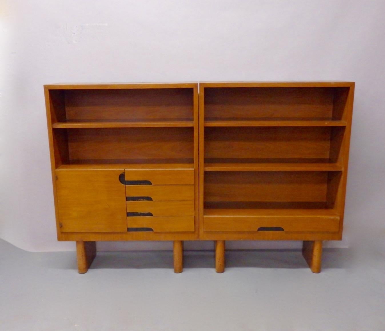 One of the earliest champions of modern design in the U.S. Gilbert Rohde brought the idea of modernism and modular suites of furniture for home and office to Herman Miller co. This is a classic example of Rohdes modularity. Three book shelf cabinets