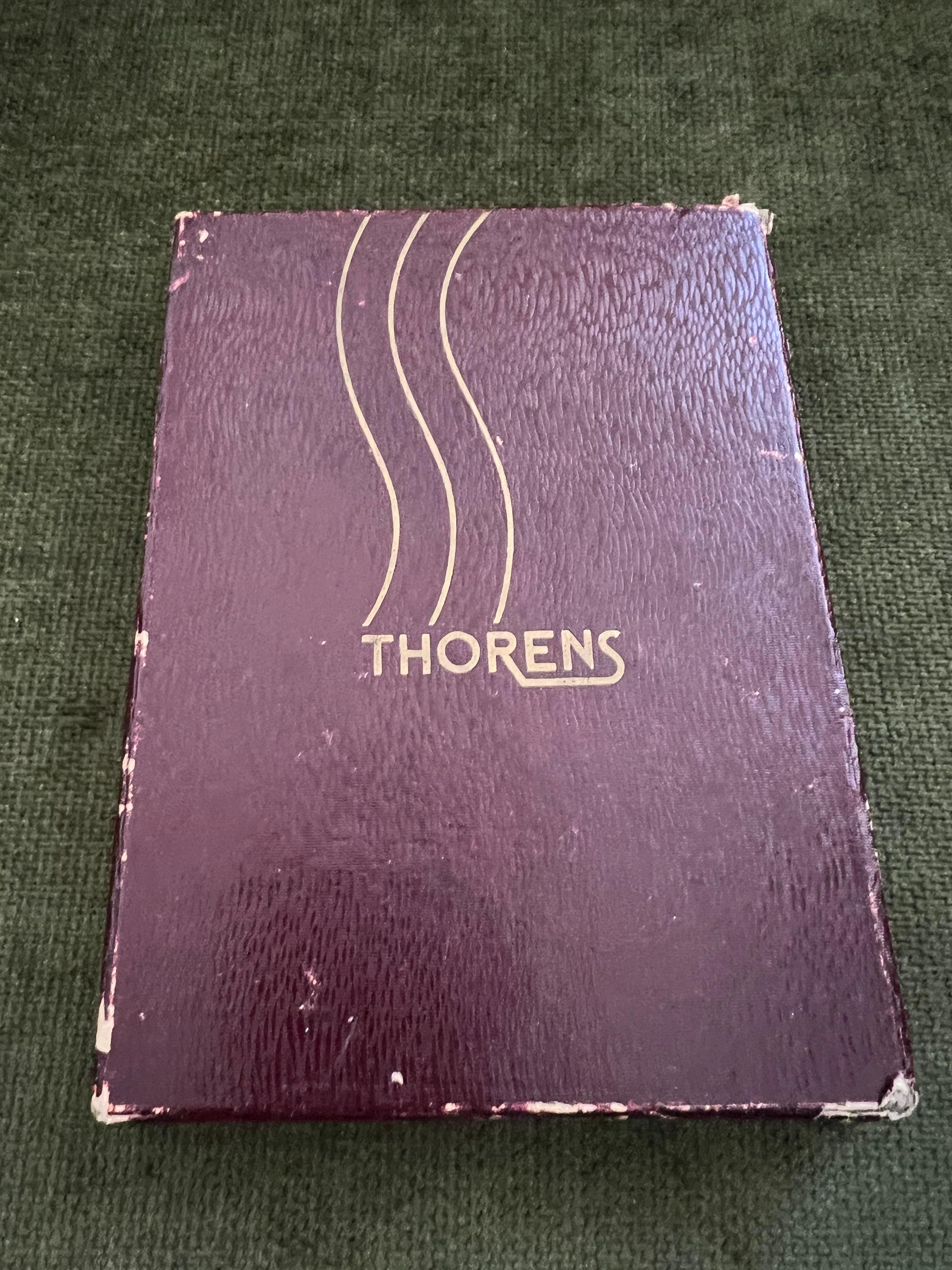 1950s Thorens Cigarette Case & Lighter
Vintage 1950s Thorens Cigarette Case and Lighter
WORKING CONDITION IN ORIGINAL BOX 
RARE 1950's Thorens
Gold Tone
Open the case, take a cigarette and then close and Lighter pops up and Ignites.
(See video)
The