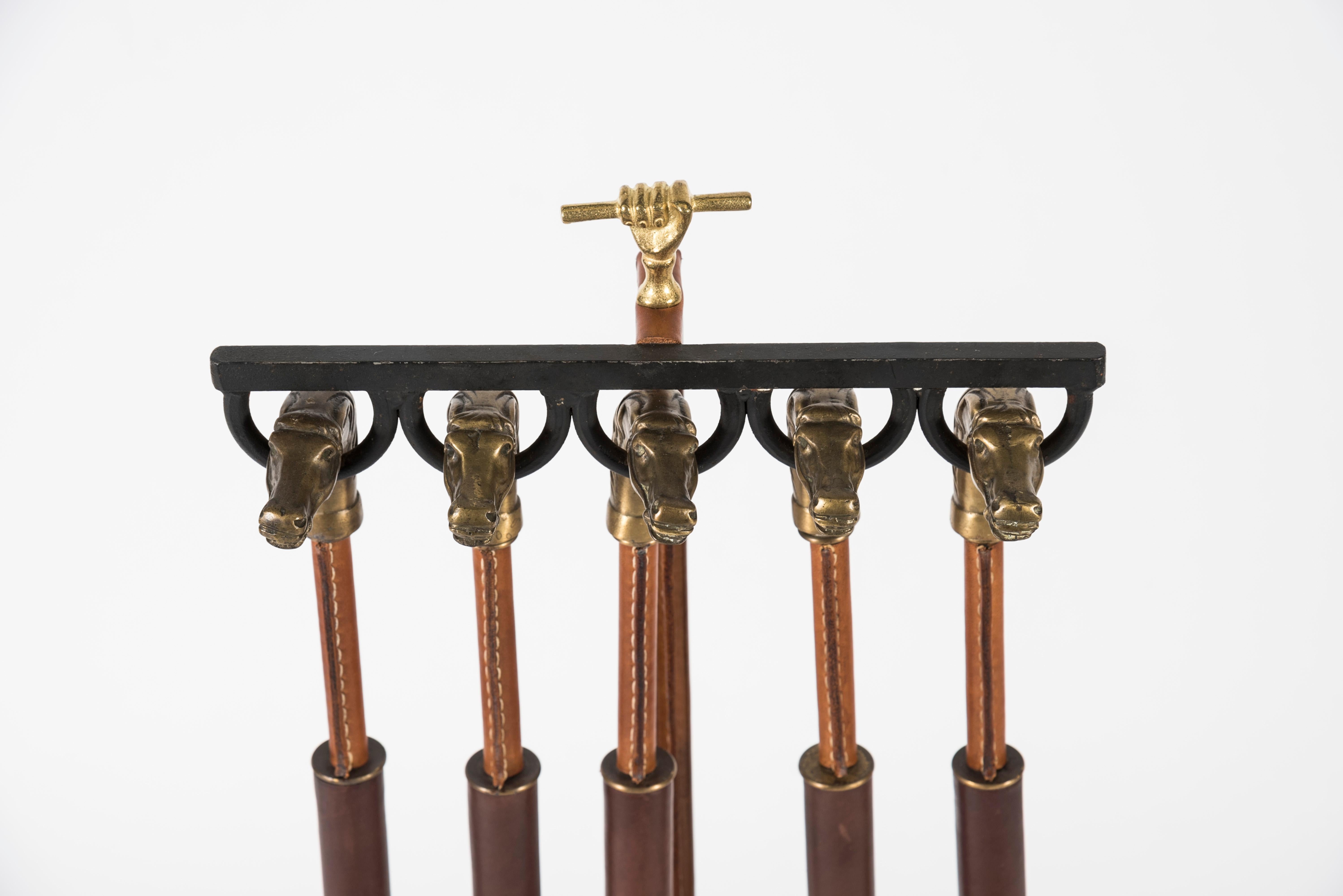 Very nice set of fireplace tools covered with stitched leather.