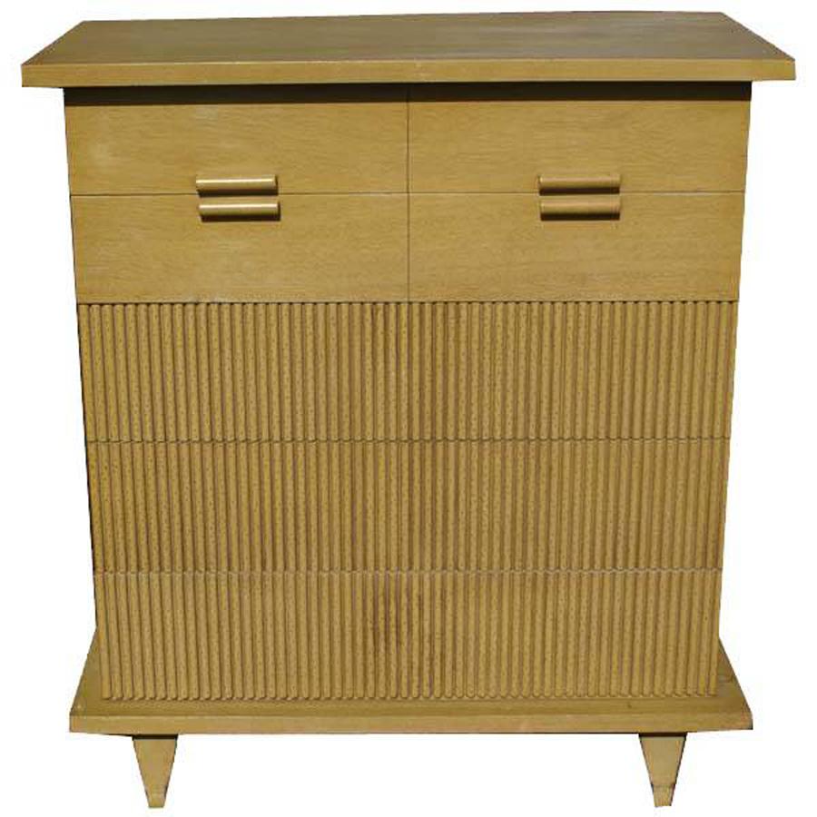 Five-drawer chest by American of Martinsville
1952

Bleached Philippine mahogany faux bamboo with five drawers. 
The three bottom drawer front appliques are perforated to simulate the look of bamboo.

Measures: 37.75