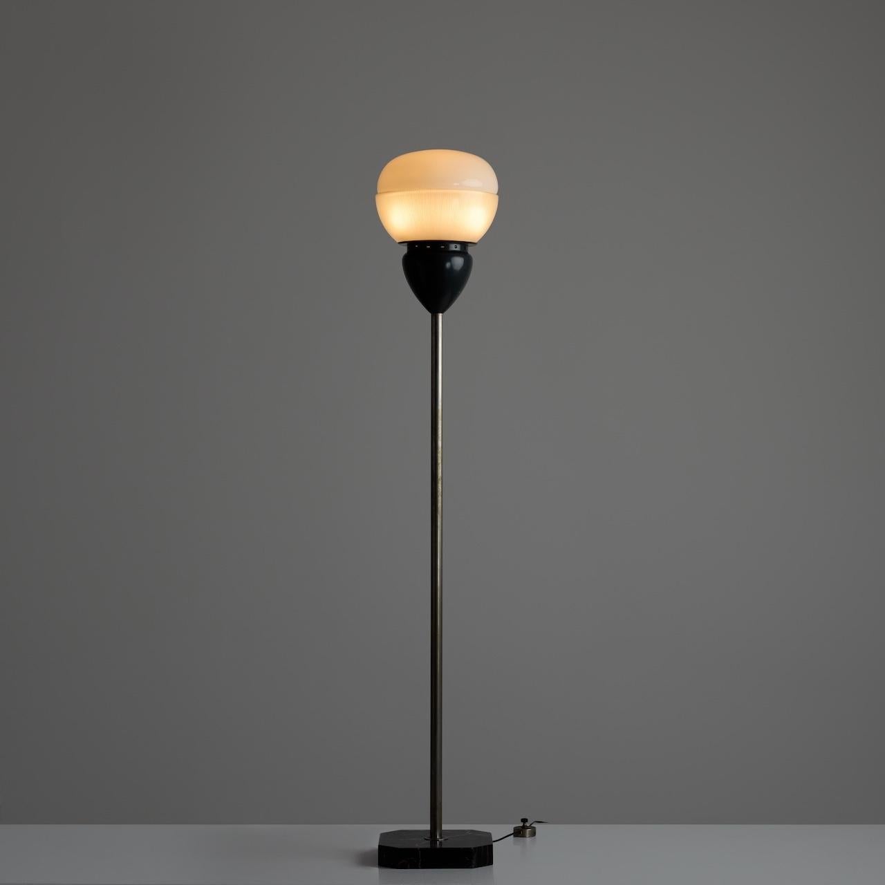 Rare Floor by Sergio Mazza for Artemide (IT, 1959)

Marble base, steel stem, enameled socket housing, reeded glass, and finally white opal top diffuser. The post floor lamp holds a single E27 socket-type, adapted for the US. We recommend a single