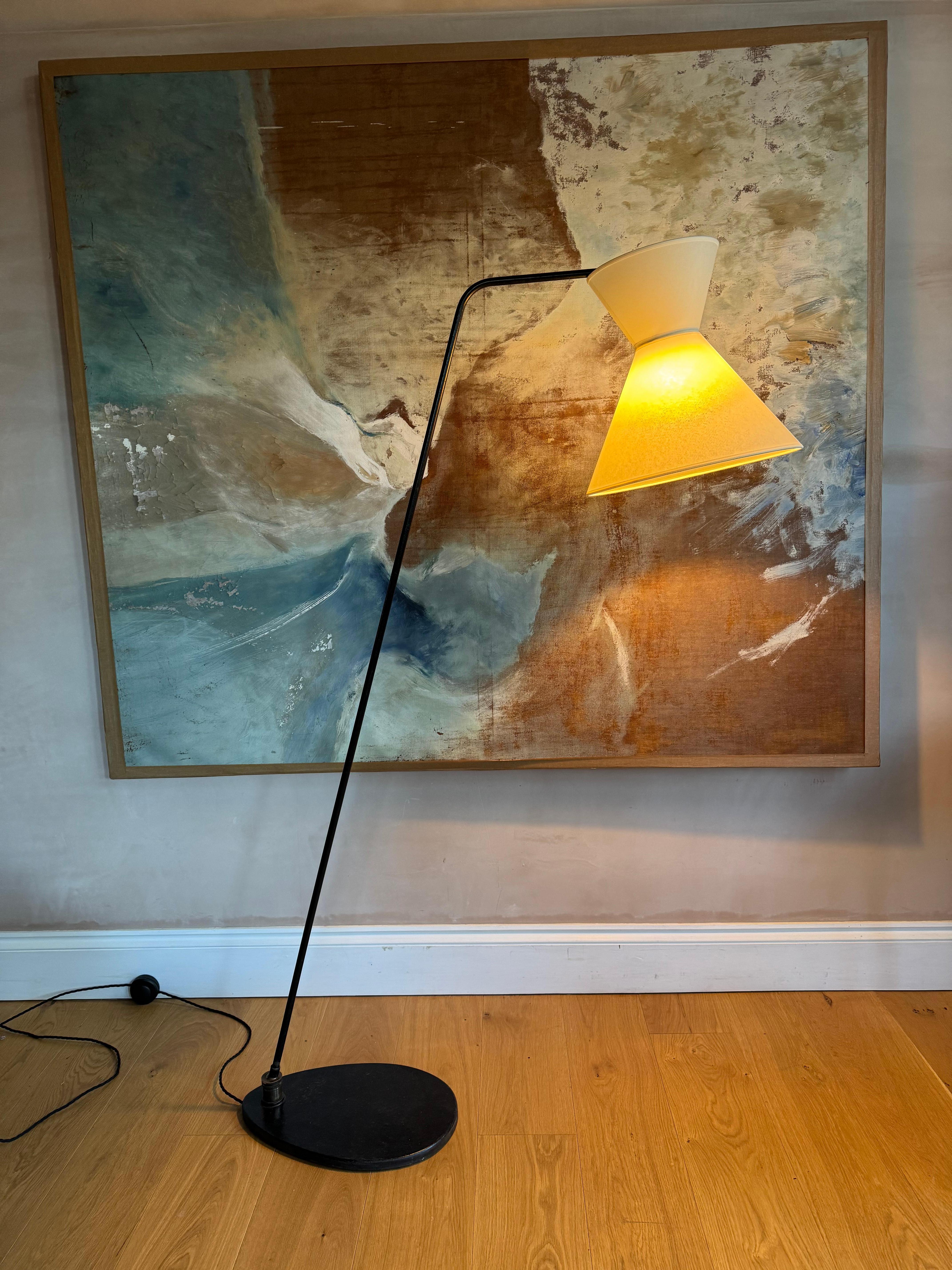 A very rare and fabulous French 1950’s articulating black metal floor lamp on cast iron pad foot attributed to Gerard Guermonprez. 