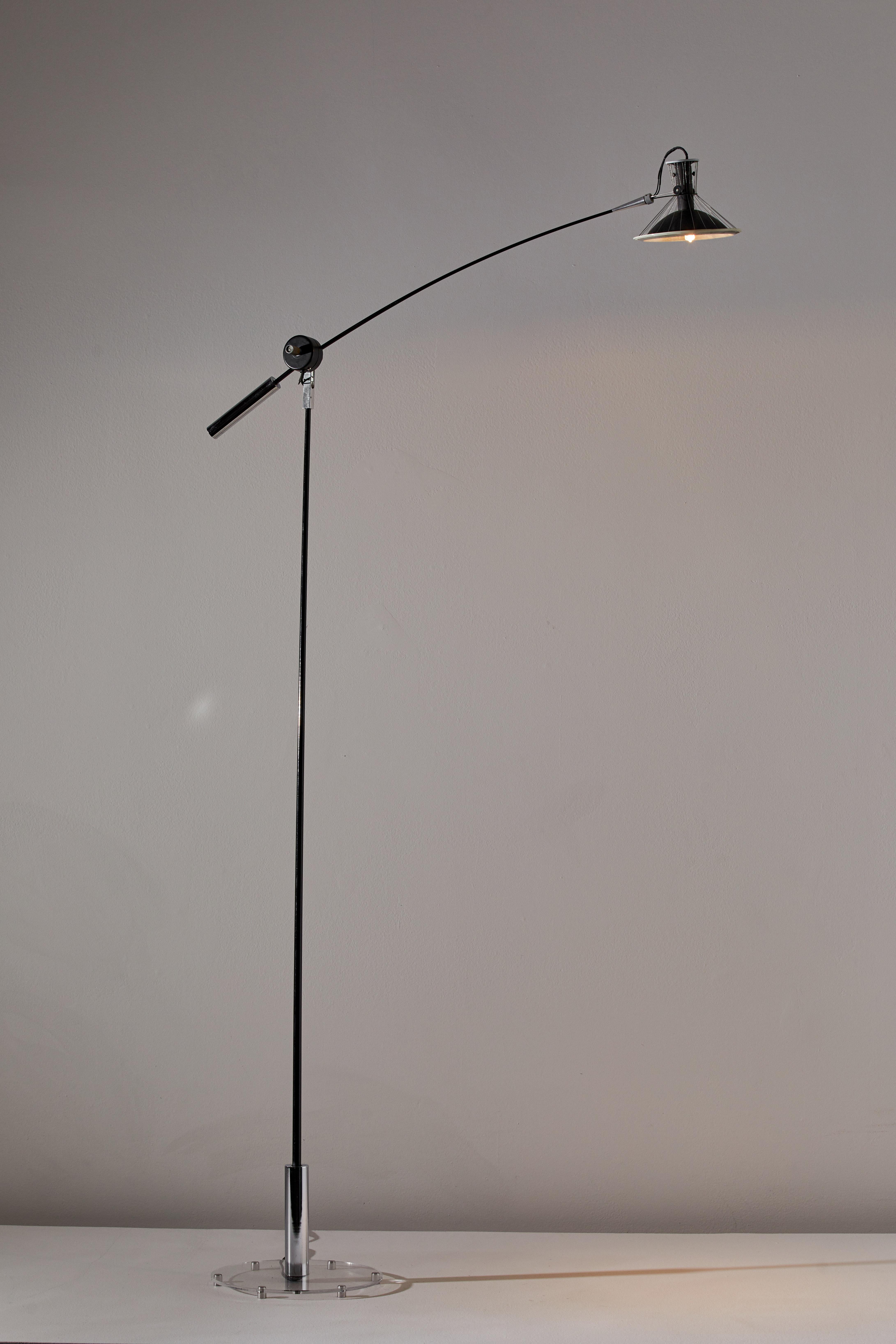 Rare floor lamp by Clive Entwistle. Designed and manufactured in the U.S., circa 1965. Lacquered fiberglass, chrome-plated steel, aluminum, acrylic, steel wire. Original cord. Takes one 50w maximum halogen bulb. Bulbs provided as a one time