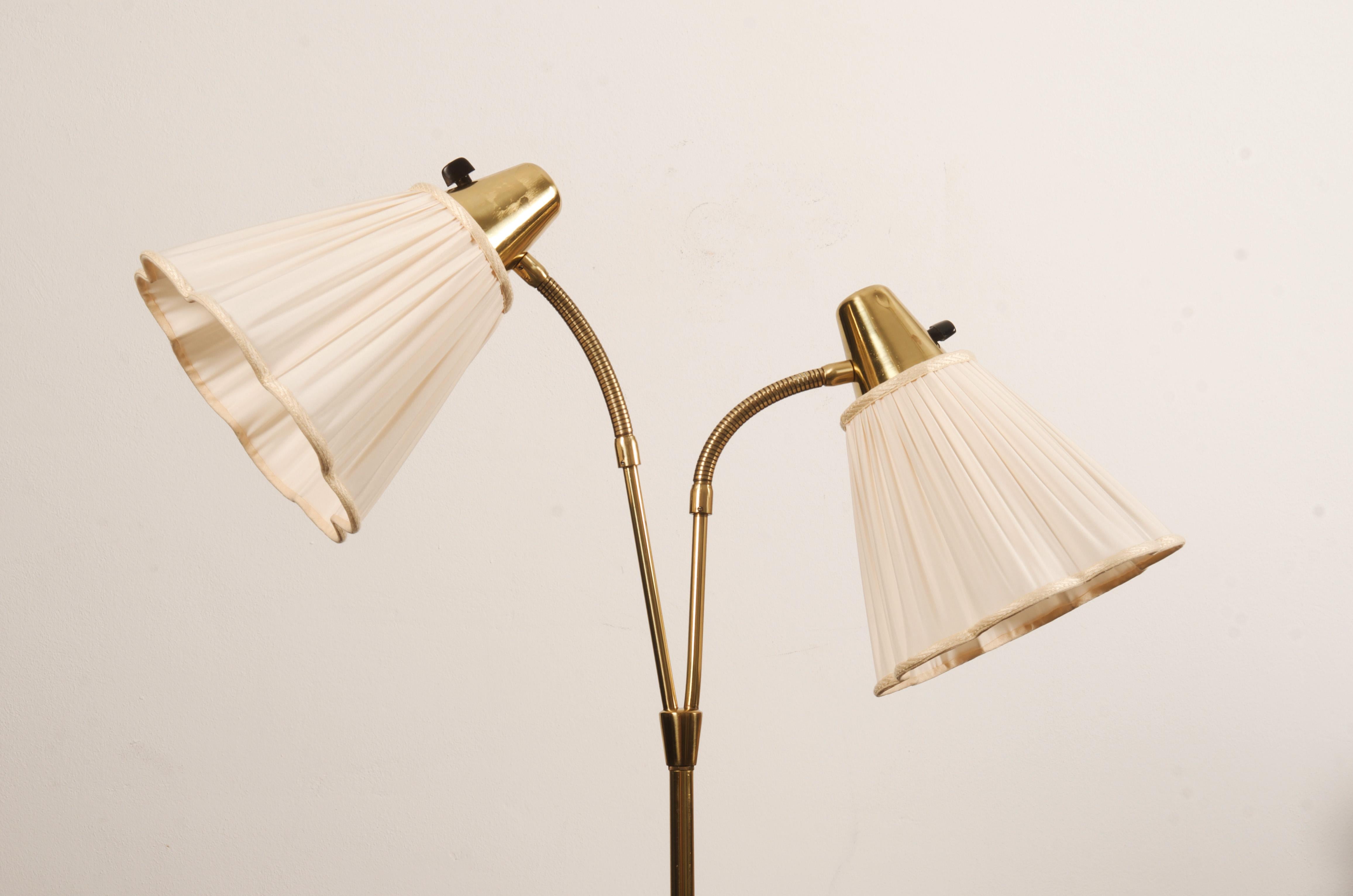 Brass/teak lamp food. Two silk shades mounted on goosneck arms fitted with each E27 socket. Made in Sweden in the 1950s.
