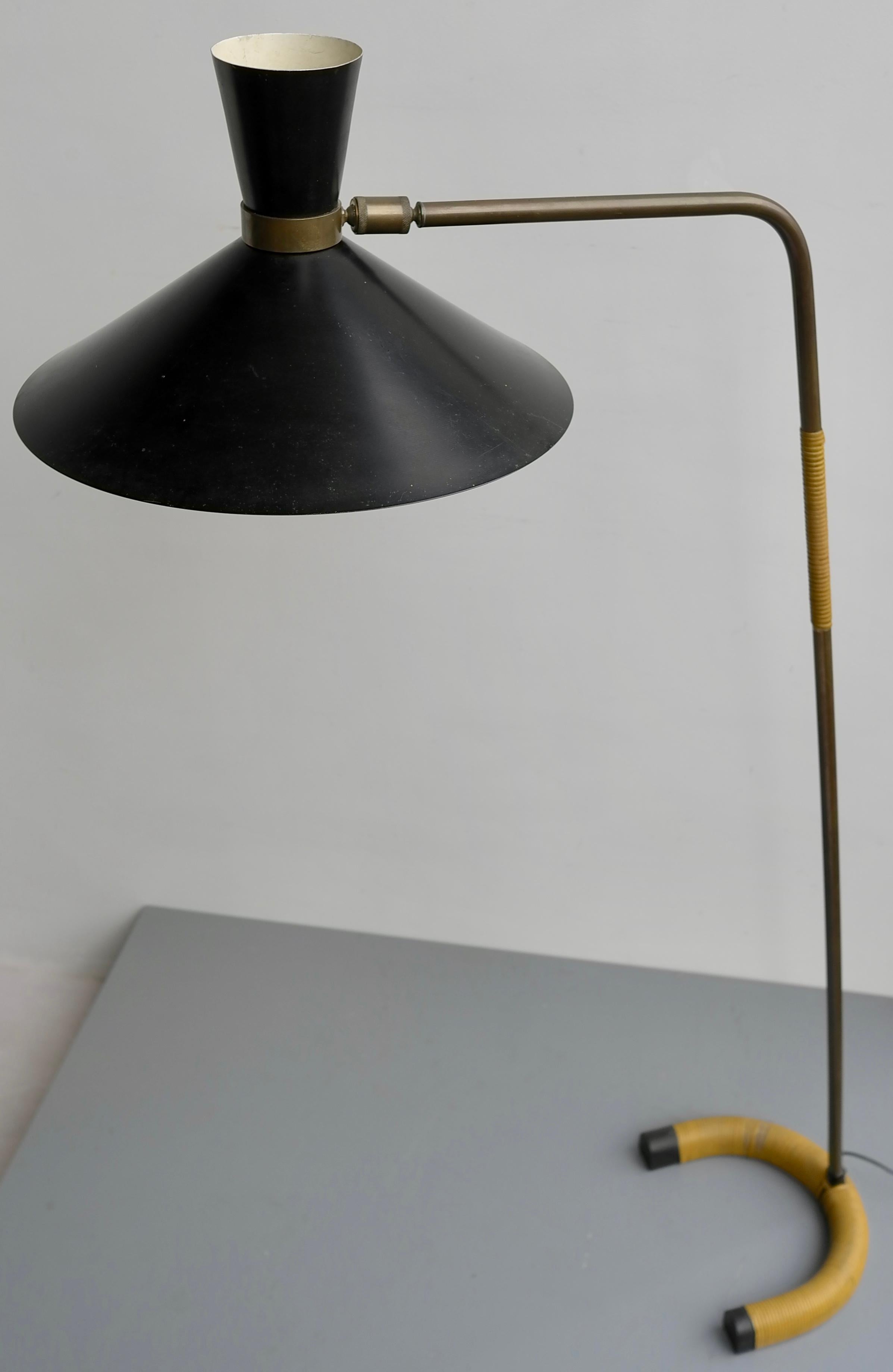 Rare French floor lamp by Jacques Biny in brass and black hood Edition Luminalite 1953 

The lamp is bamboo wrapped on the foot and rod.