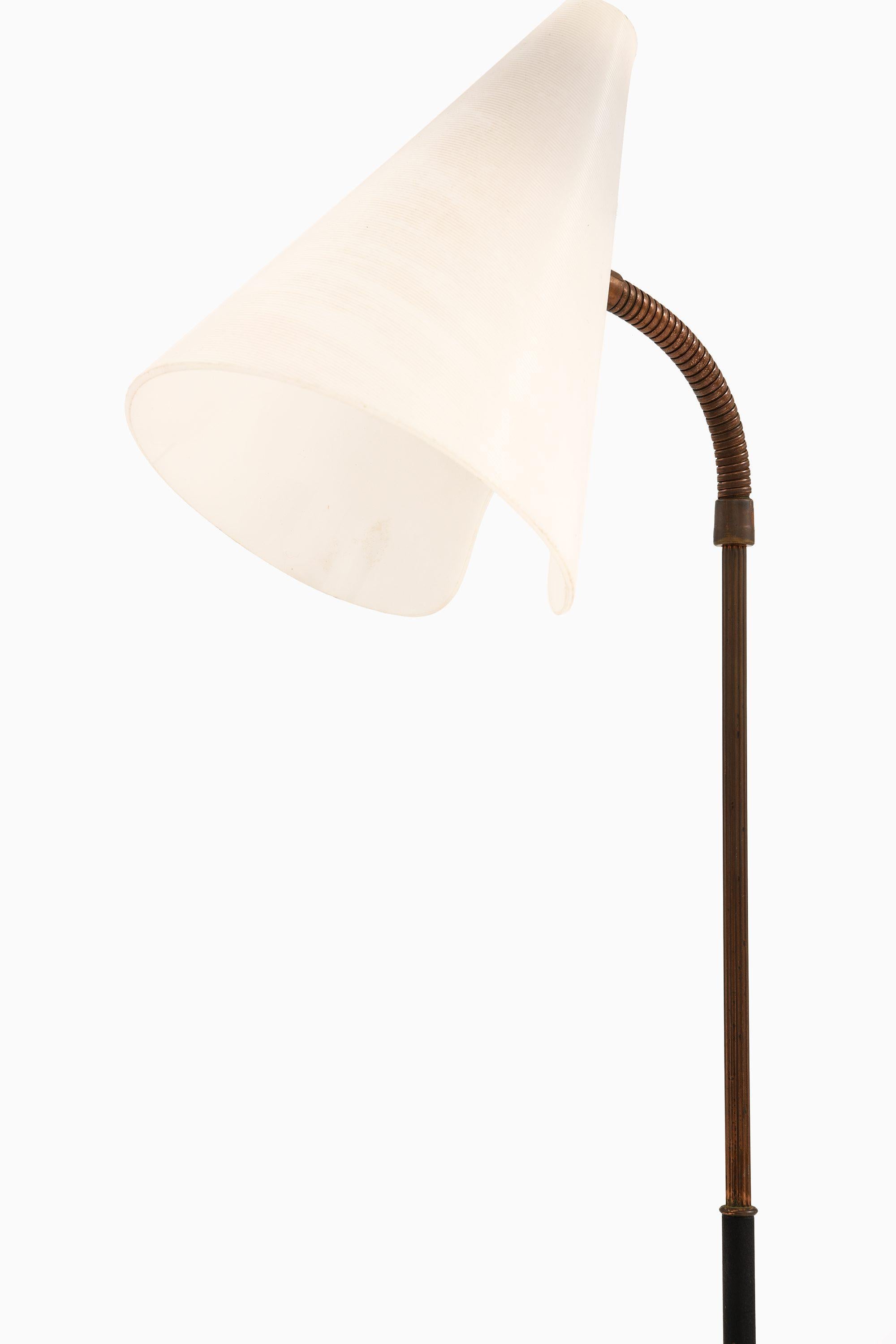 Rare Floor Lamp in Black Lacquered Metal, Brass and White Plastic, 1950’s

Additional Information:
Material: Black lacquered metal, brass and white plastic
Style: Mid century, Scandinavian
Produced in Sweden
Dimensions (W x D x H): 18 x 36 x 130
