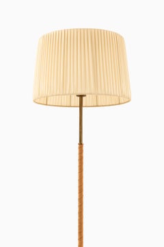 Rare Floor Lamp in Brass and Leather by Harald Notini, 1940s