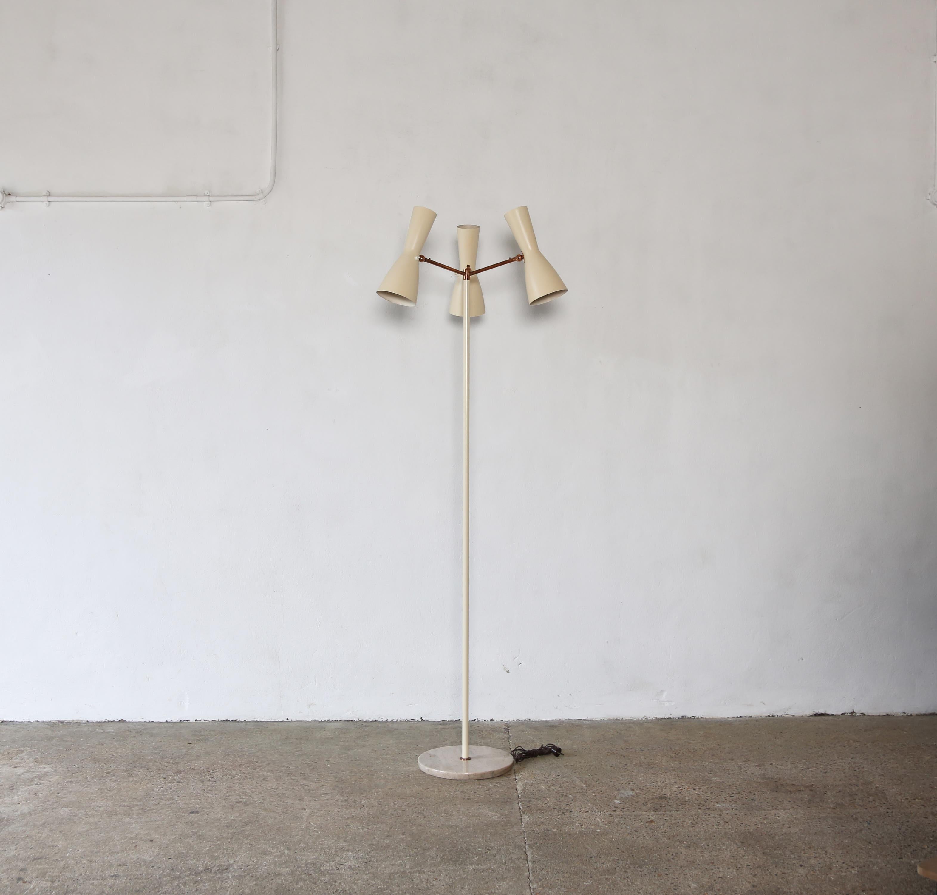 A rare floor lamp, by Lumen, Italy, 1960s. Requires local rewiring prior to use. Fast shipping worldwide.

