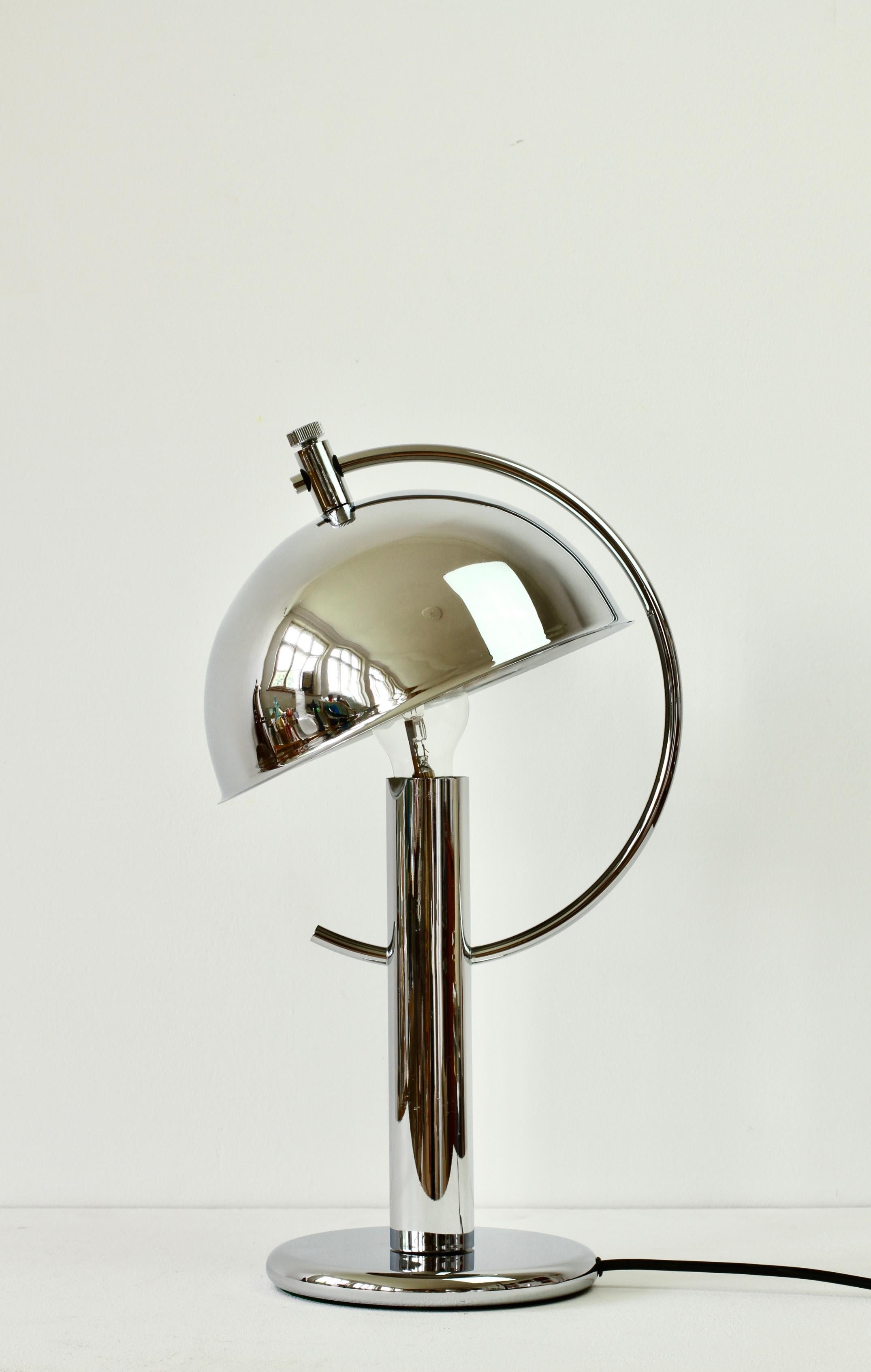 Rare Mid-Century Modern vintage German made table lamp or desk light by Florian Schulz circa 1980s. Featuring polished chrome plated hardware (now with age related patina) and an adjustable round shade making this the perfect modernist style reading