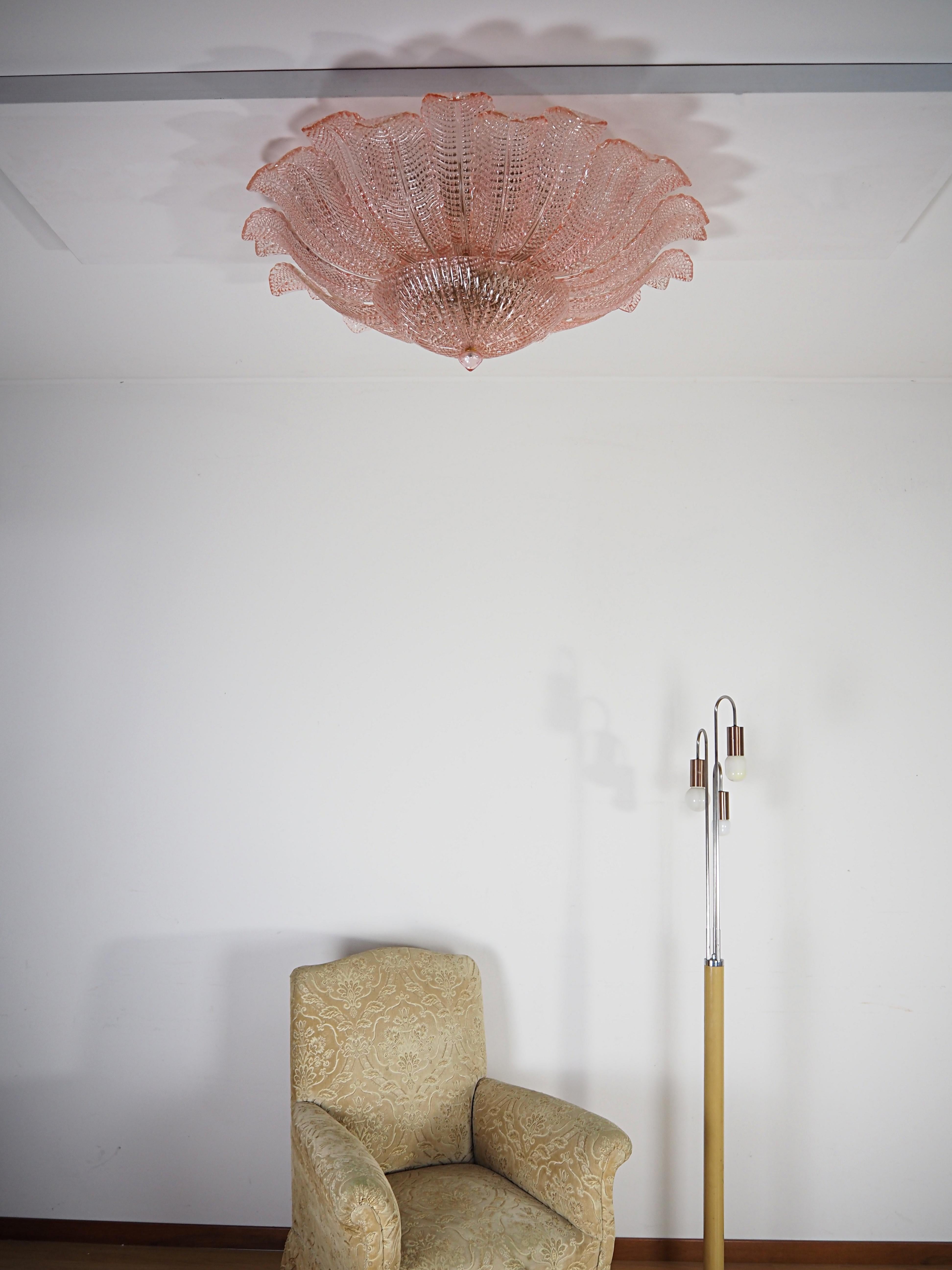 Fantastic and fabulous of vintage art glass ceiling light. The rare lamp is made of 24 mouth-blown hand-formed leaf-form PINK glass panels plus a huge glass as a bottom.This beauty has the look of a precious big flower. Especially when lit it gives