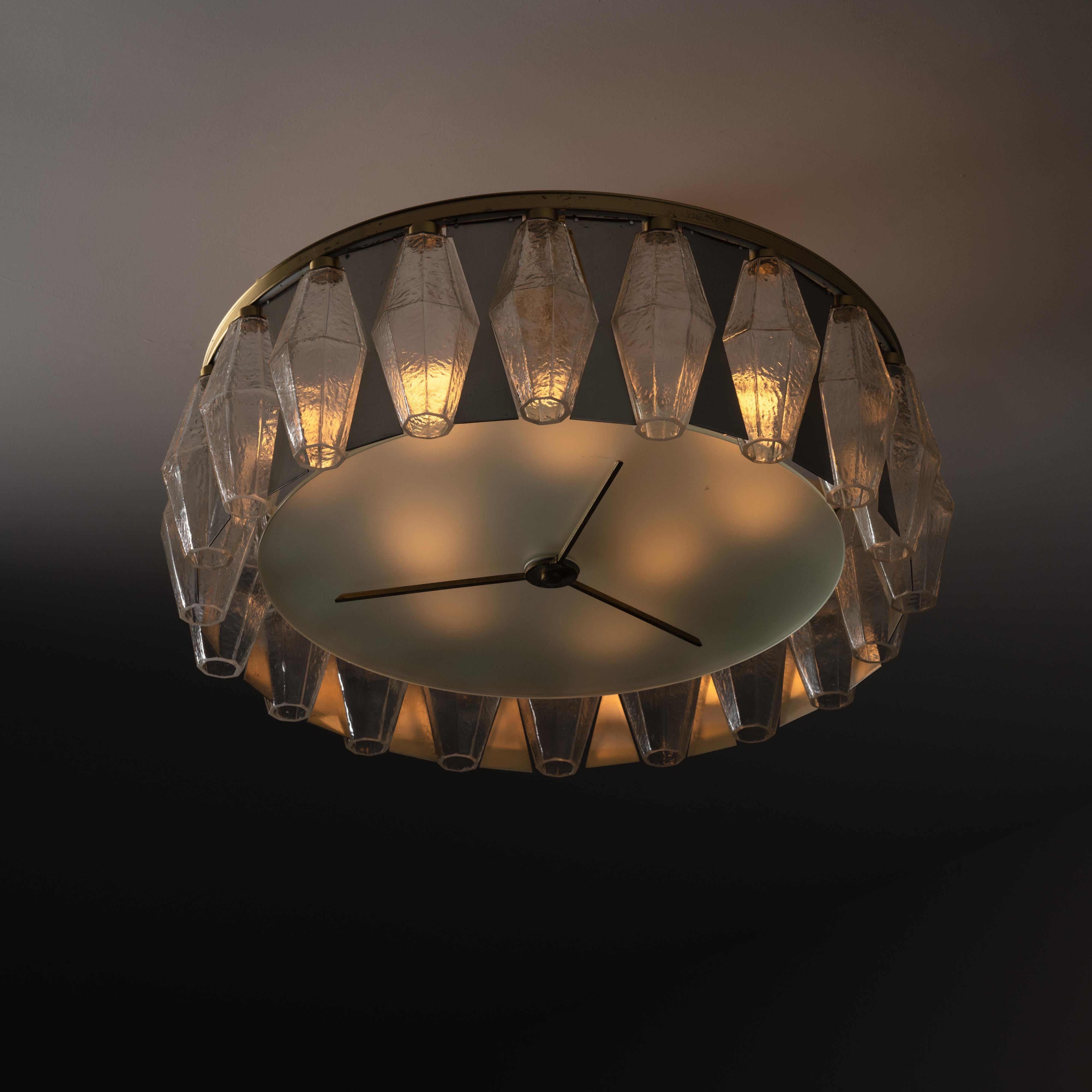 Rare Flush Mount by Carlo Scarpa for Venini. Designed and manufactured in Italy, circa 1960. Incredible circular flush mount with individual glass diffusion prisms separated by flat aluminum spacers. The flush mount features brass frame detailing,