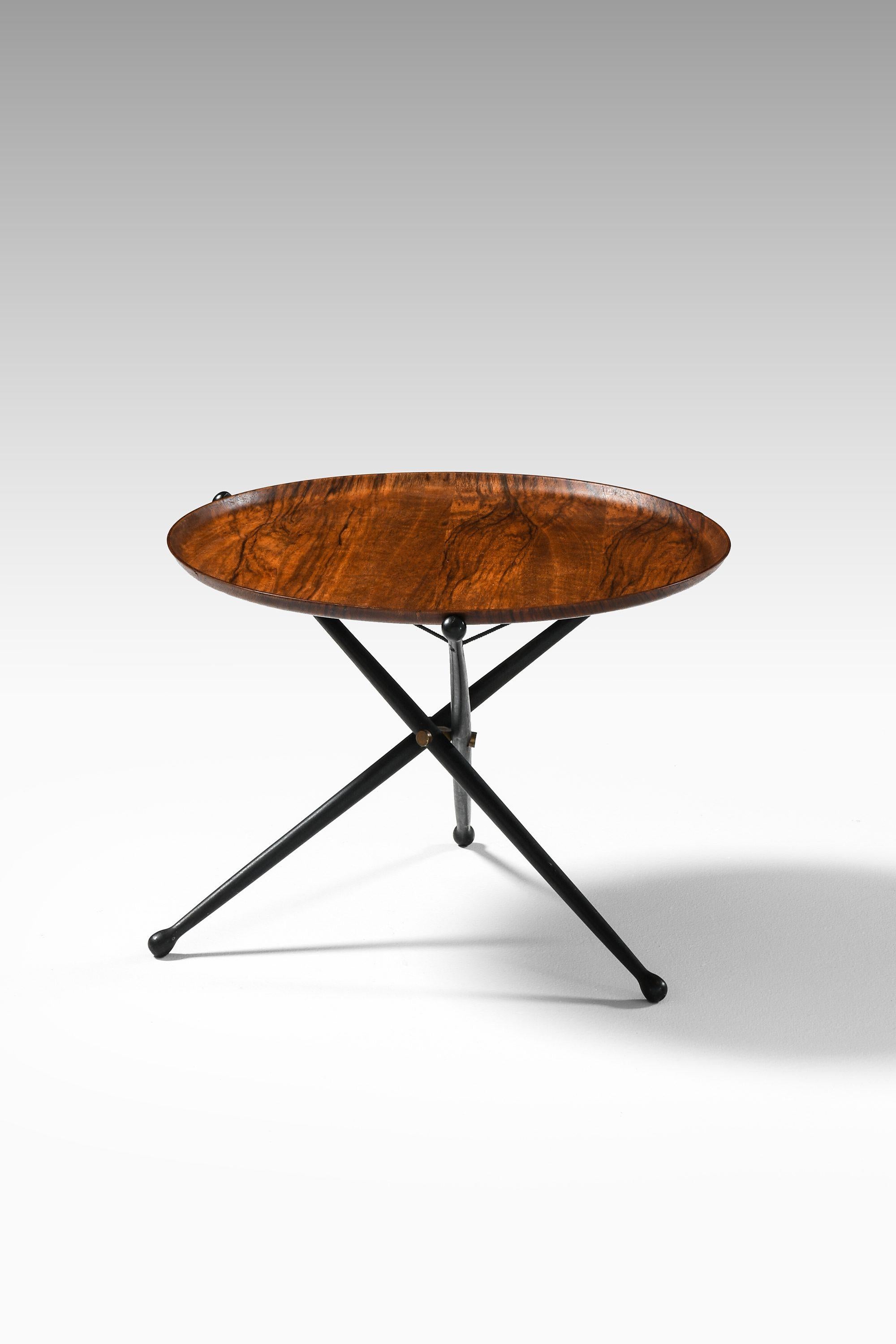 Rara mesa auxiliar plegable de palisandro, latón y madera lacada en negro, años 50 Danés en venta