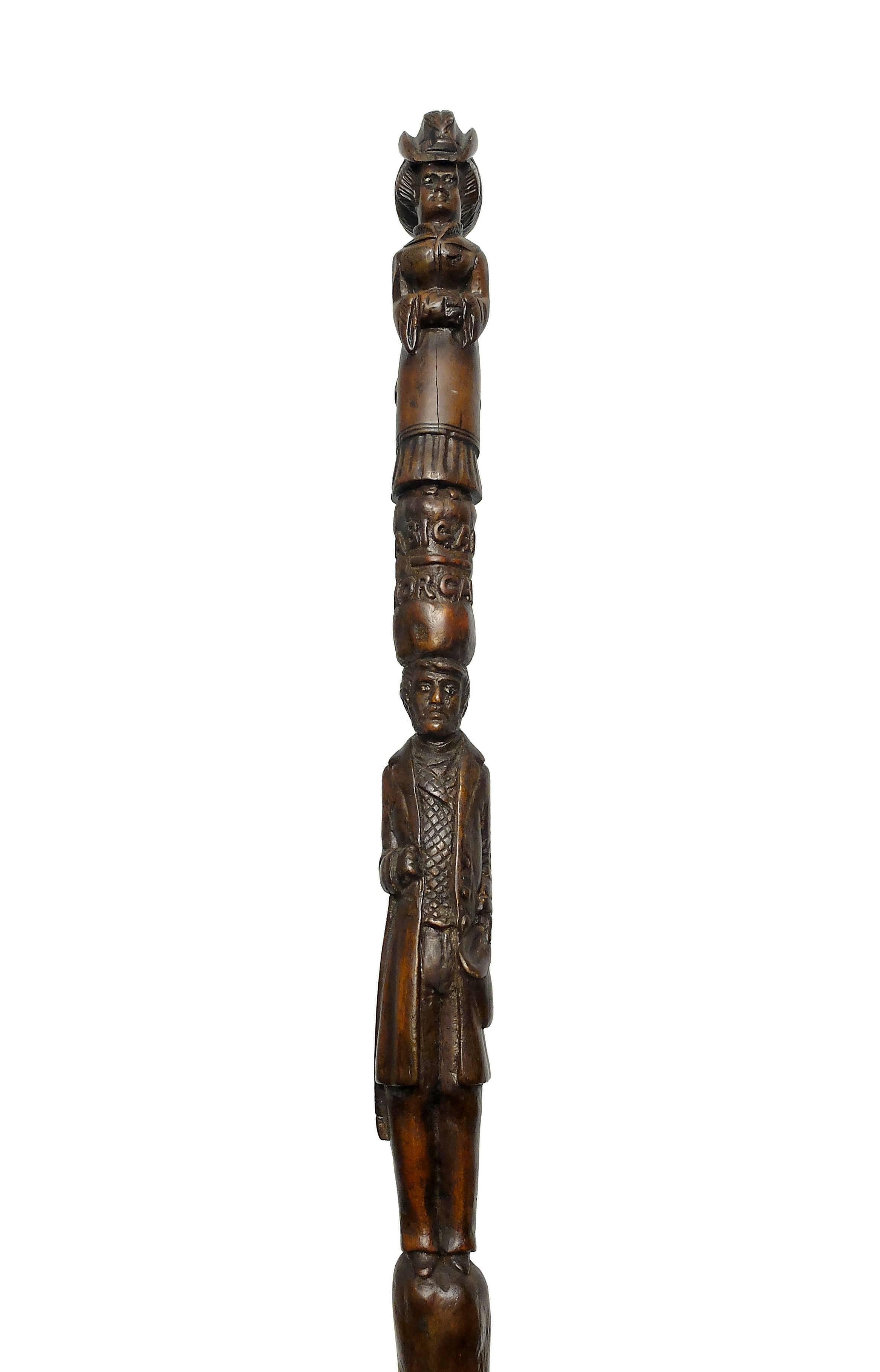 An extremely rare English Folk Art cane, carved in a single piece of fruitwood, superb patina and superb quality of the details. The cane tells us that Ms.Abigale and Mr. Morgan got married in 6/6/1868, both of them elegantly and carefully dressed,