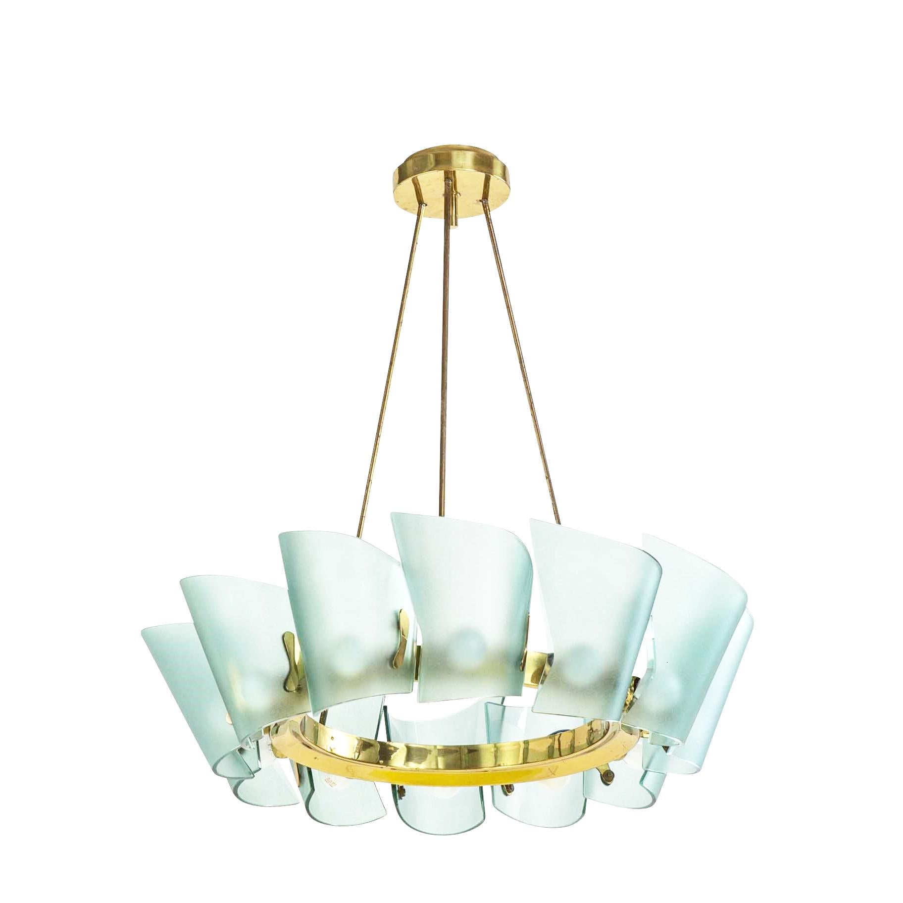 Stunning 1960s chandelier designed by Max Ingrand for Fontana Arte featuring twelve acqua colored glasses on a brass frame. Each glass is of the highest quality with beveled edges and a satin finish.

Condition: Excellent vintage condition, minor