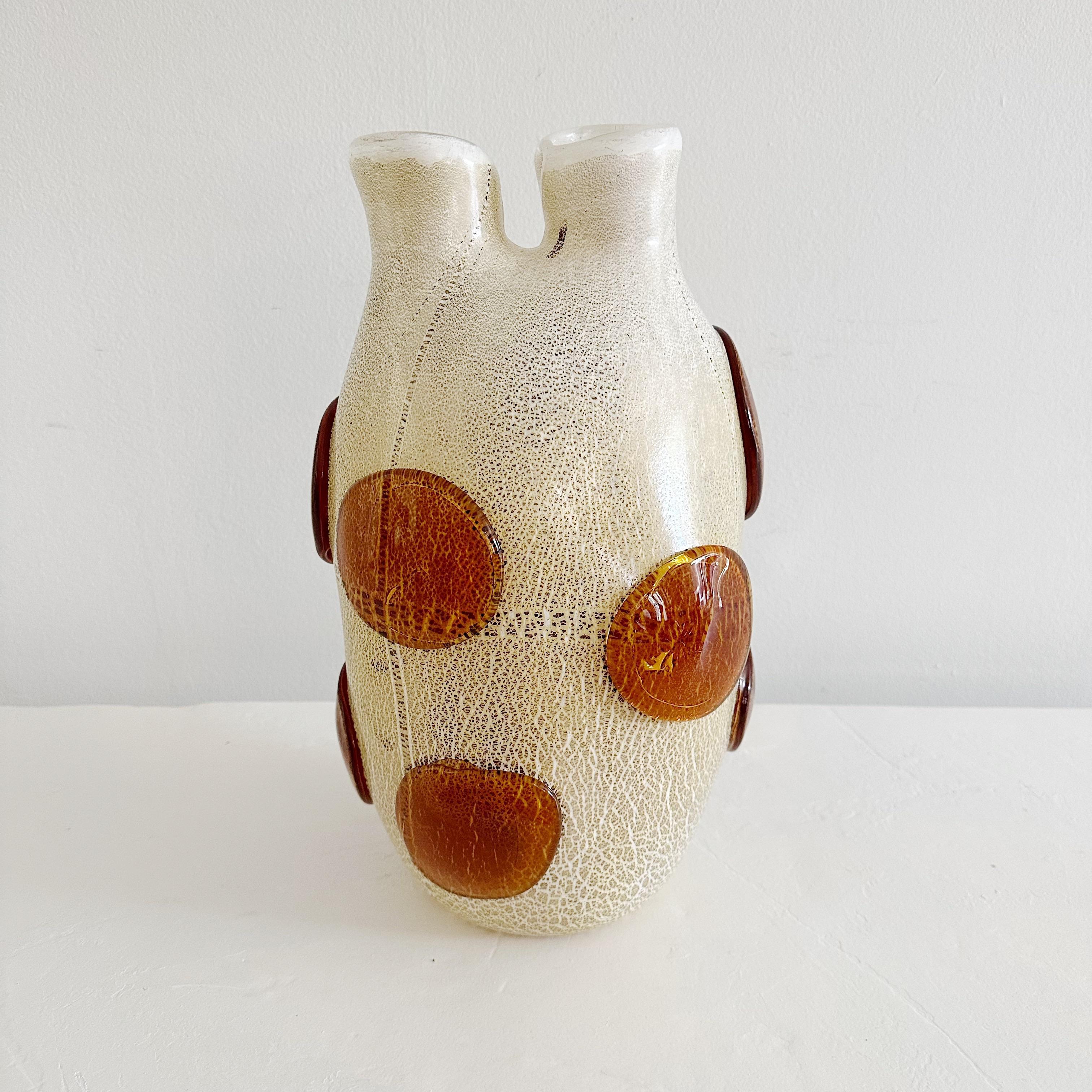 Rare double neck Murano glass Vase by Constantini from the 1980's The cream and white and gold fleck body is decorated with round Amber colored freeform reliefs. Signed on underside 
