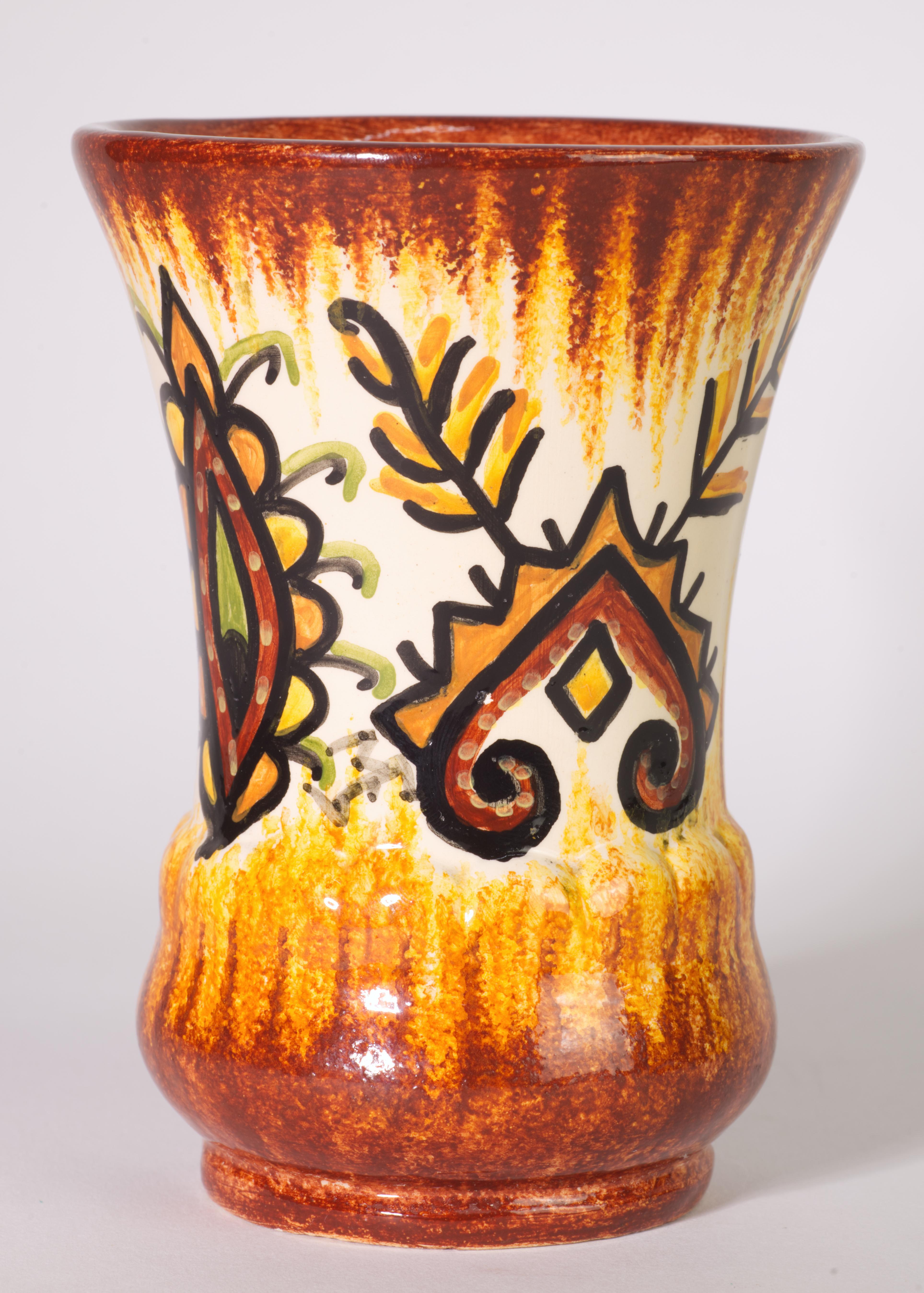  Rare Paul Fouillen Quimper faience vase is hand painted with abstract decor of wide bands on the base and on the rim and abstract patterns in the central area of the vase. Cohesive yellow, olive, burnt orange, and chocolate brown palette of the