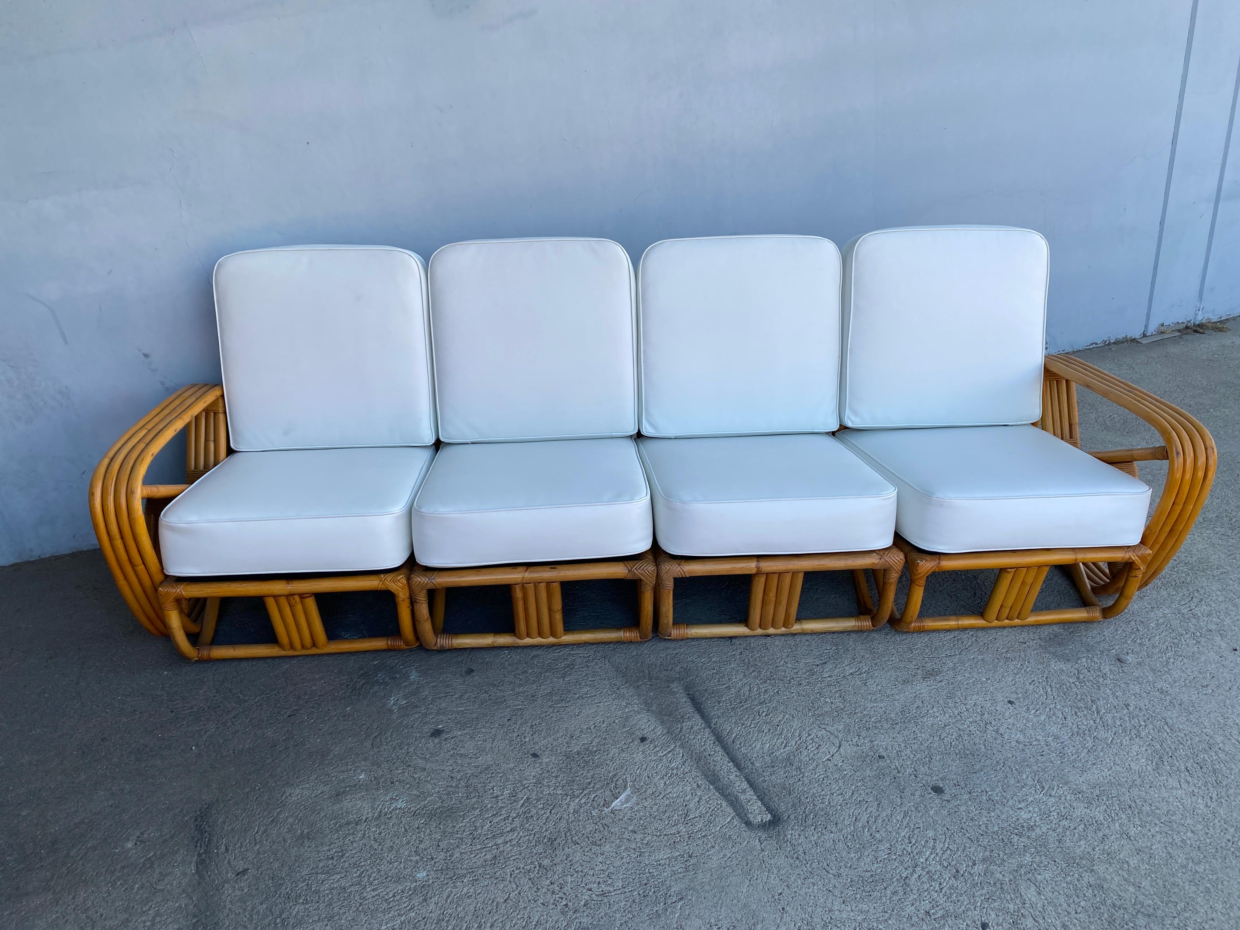 Art Deco era four-strand square pretzel style, Four-seat sectional sofa. This sofa features the famous square pretzel side arms with a unique Zig-Zag pattern in the arm and stacked rattan base.

Restored new for you.

Tropical Sun Rattan was
