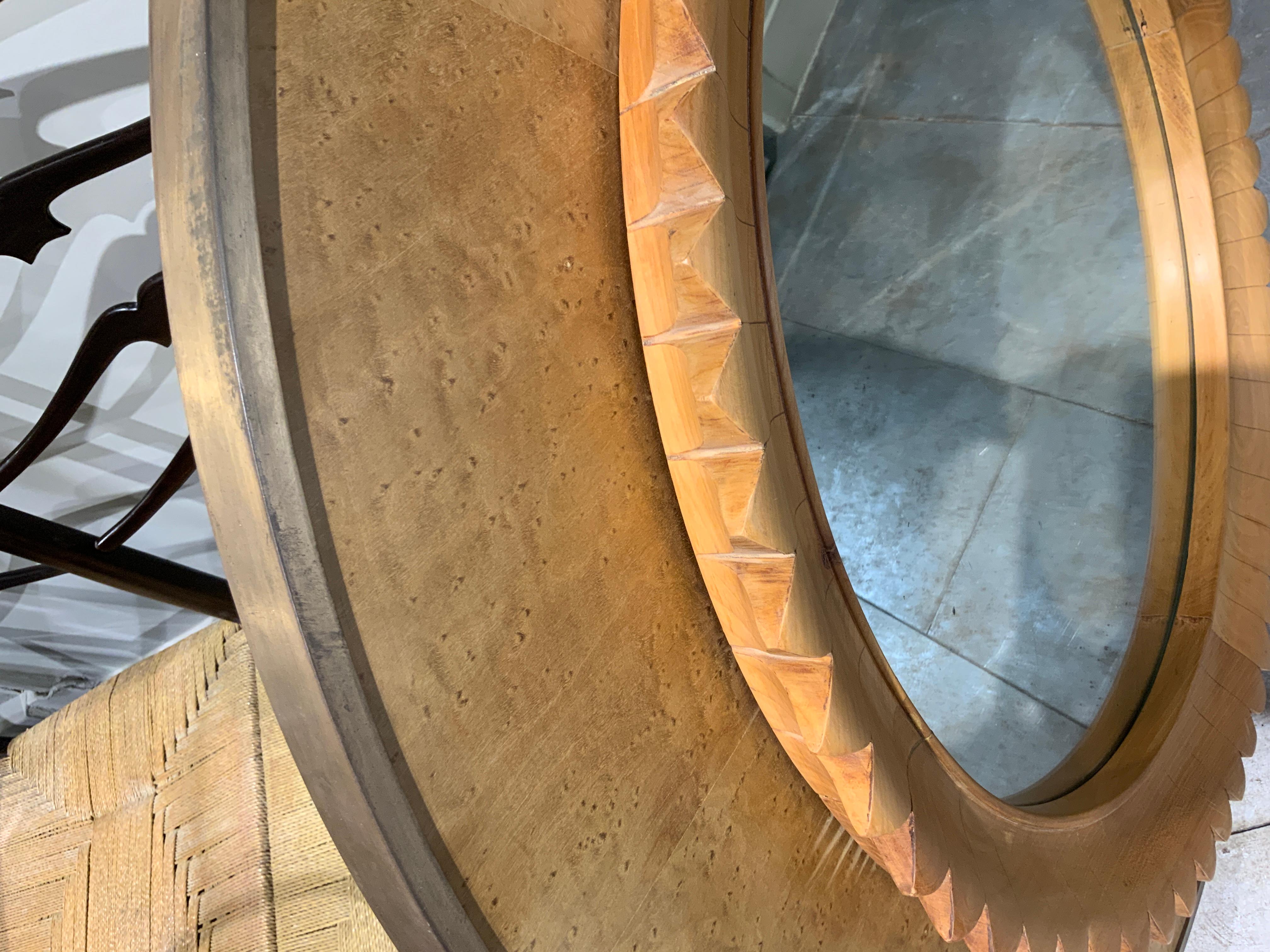 A very rare Fratelli mirror with speckled maple Italy circa 1960
Brass frame 
Diameter 100 cm 
