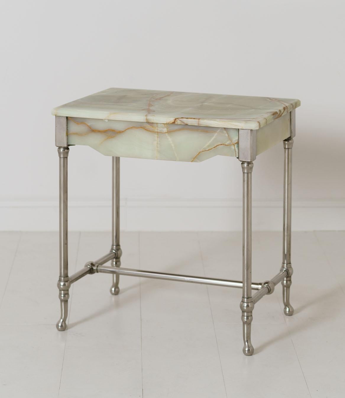 A rare agate patisserie table on a nickel-plated base, dated to the early 20th century. This beautiful piece came from a patisserie shop in Avignon, the Provence region of France, circa 1920.
 