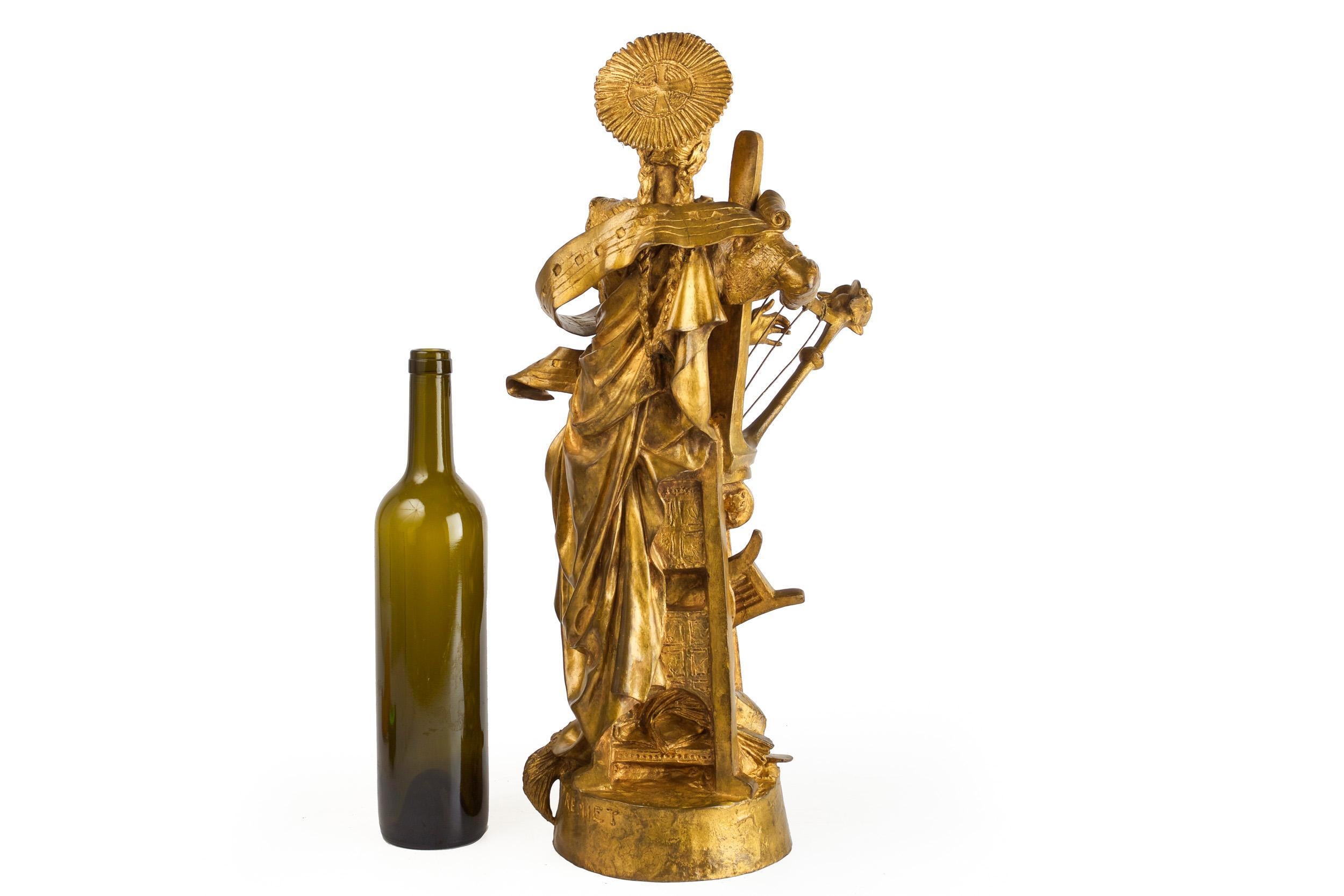 A most rare model of Fremiet's St. Celicia, it features a vibrant gilded patina over a heavily textured and worked bronze. Unlike the carefully finished and often silky surfaces of Fremiet's serialized casts, the present model exhibits more like a