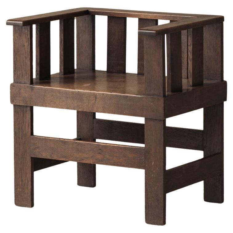 Rare French armchair in said oak, early 1930s. For Sale