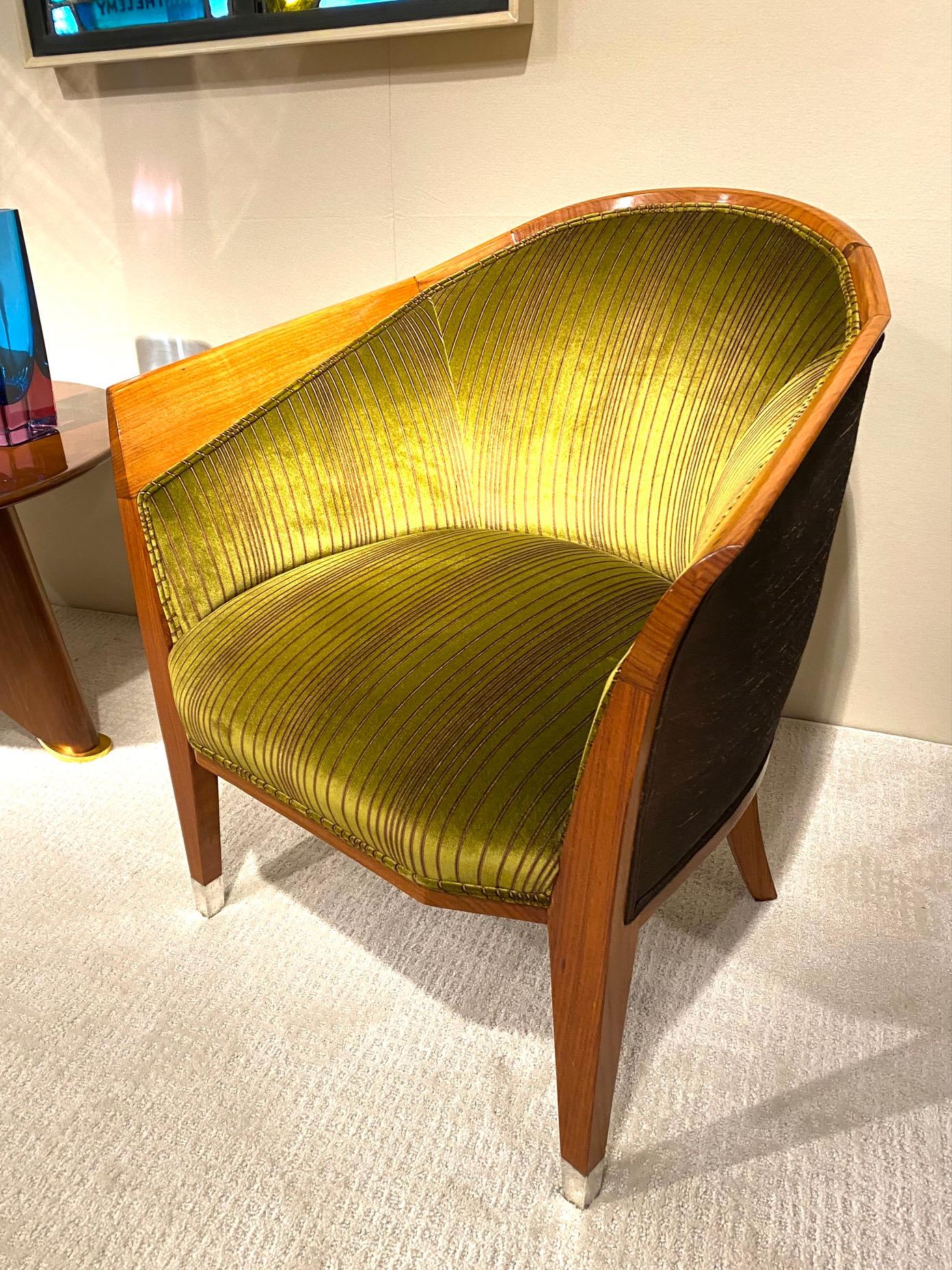 Rare French Art Deco period Rosewood armchair , fitted with silvered brass hoofs , upholstered with green velvet fabric. Maison Dominique , Andre Domin & Marcel Genevrière , Paris France: circa 1925. Reference Art Deco les maîtres du mobilier le