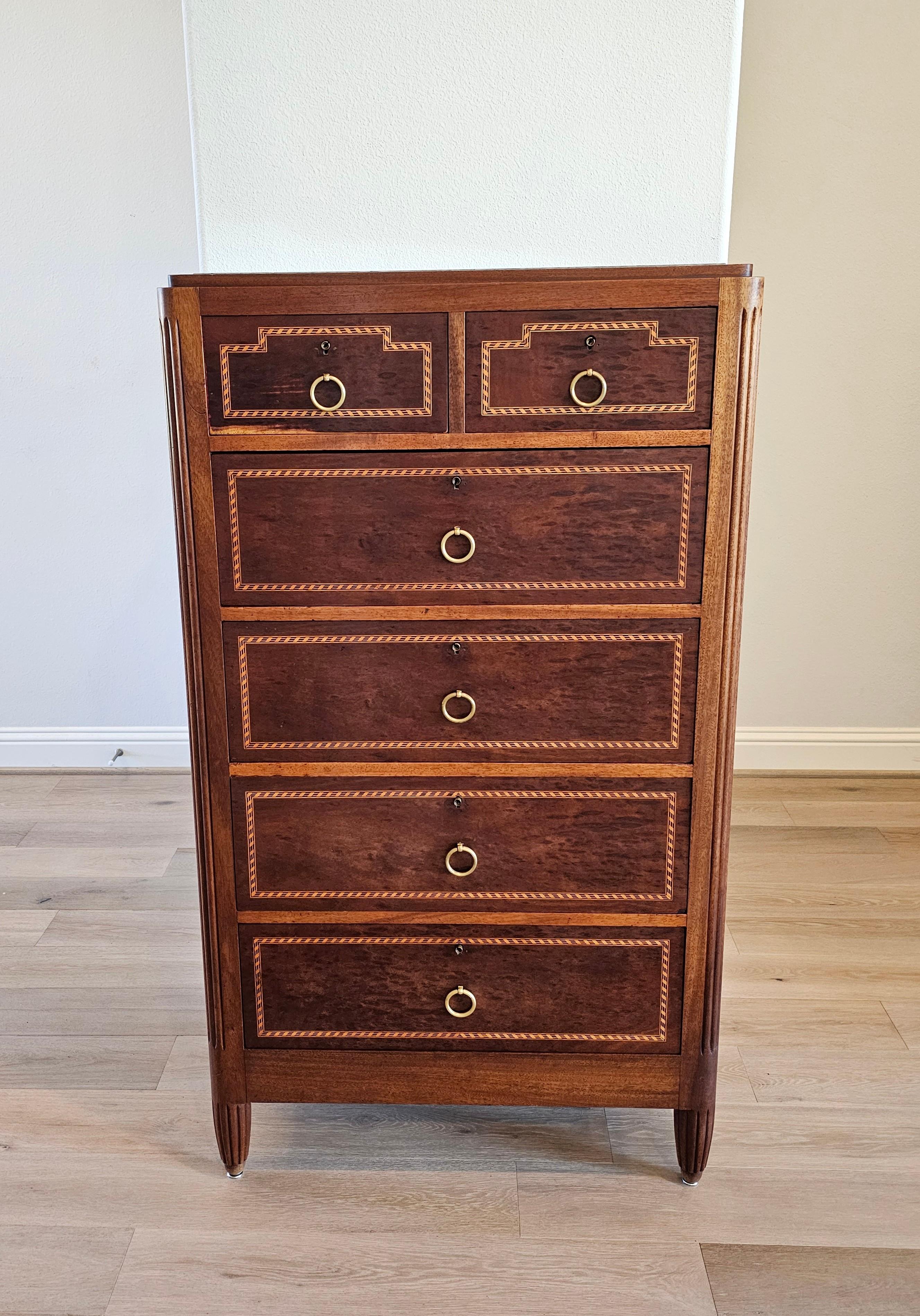 A spectacular scarce French Art Deco mahogany tall chest of drawers / semainier commode by important French ébéniste and designer Mercier & Chaleyssin.

Exquisitely handcrafted in France, circa early 1930s, exceptionally executed in luxurious Art