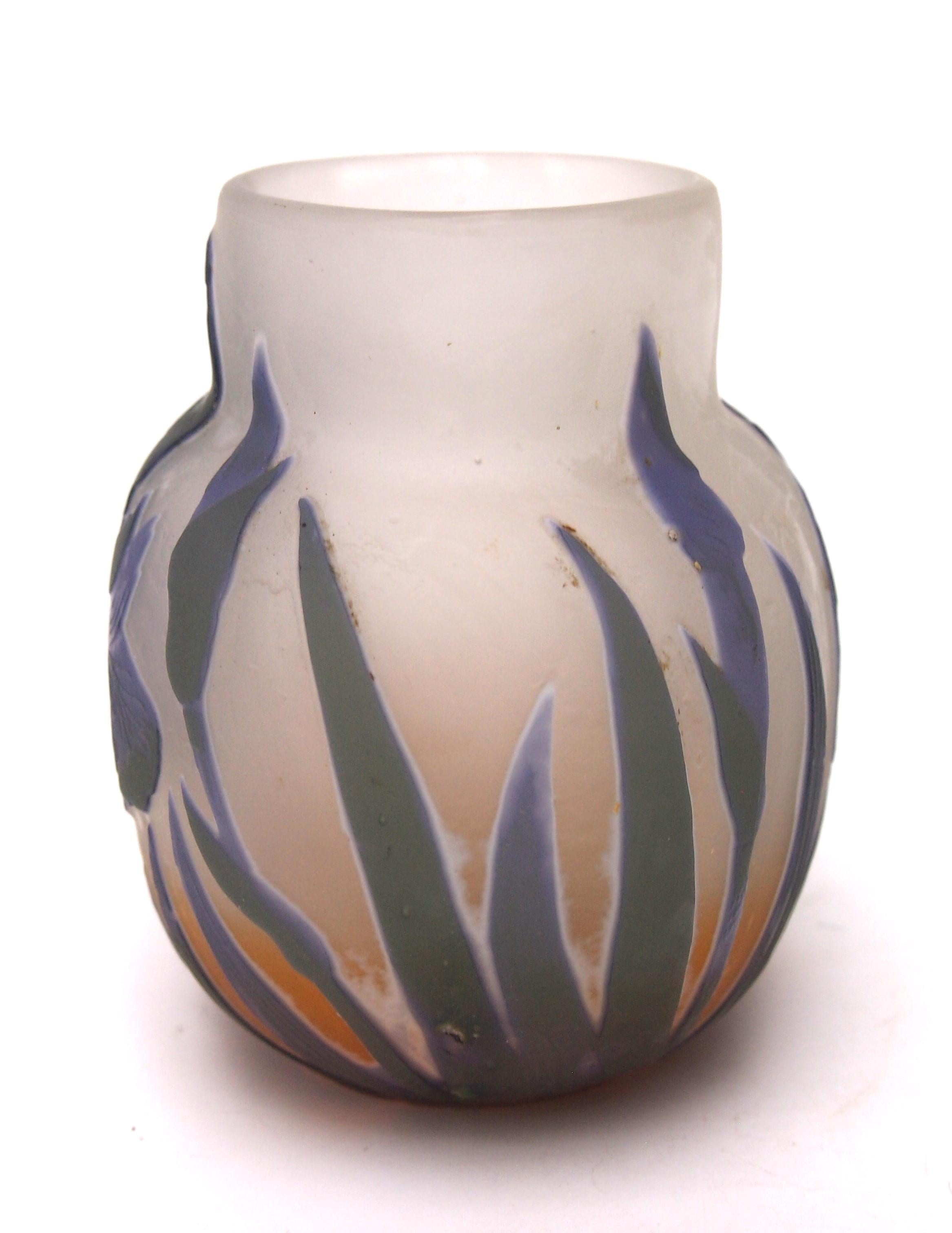 Rare four colour Emile Galle cameo vase in green, purple and opaque white over bright orange depicting striking blooming Irises and leaves. This is a pattern designed c1908 and this example dates to c1908 (Signed Provost Mark III -see signature