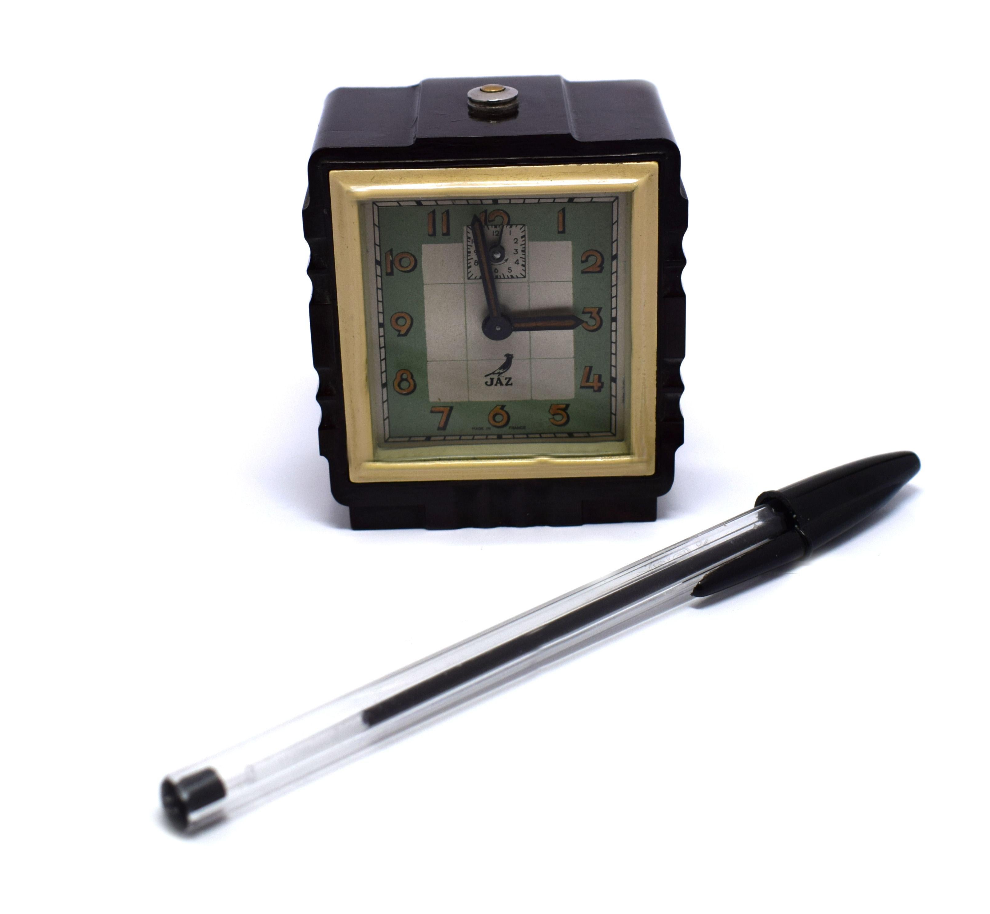 Very attractive 1930s Art Deco French alarm clock in miniature form. These clocks are without doubt very hard to come by in this size, we've only had 3 in the past year. Made by the French maker Jaz , In very good condition, the bakelite is as