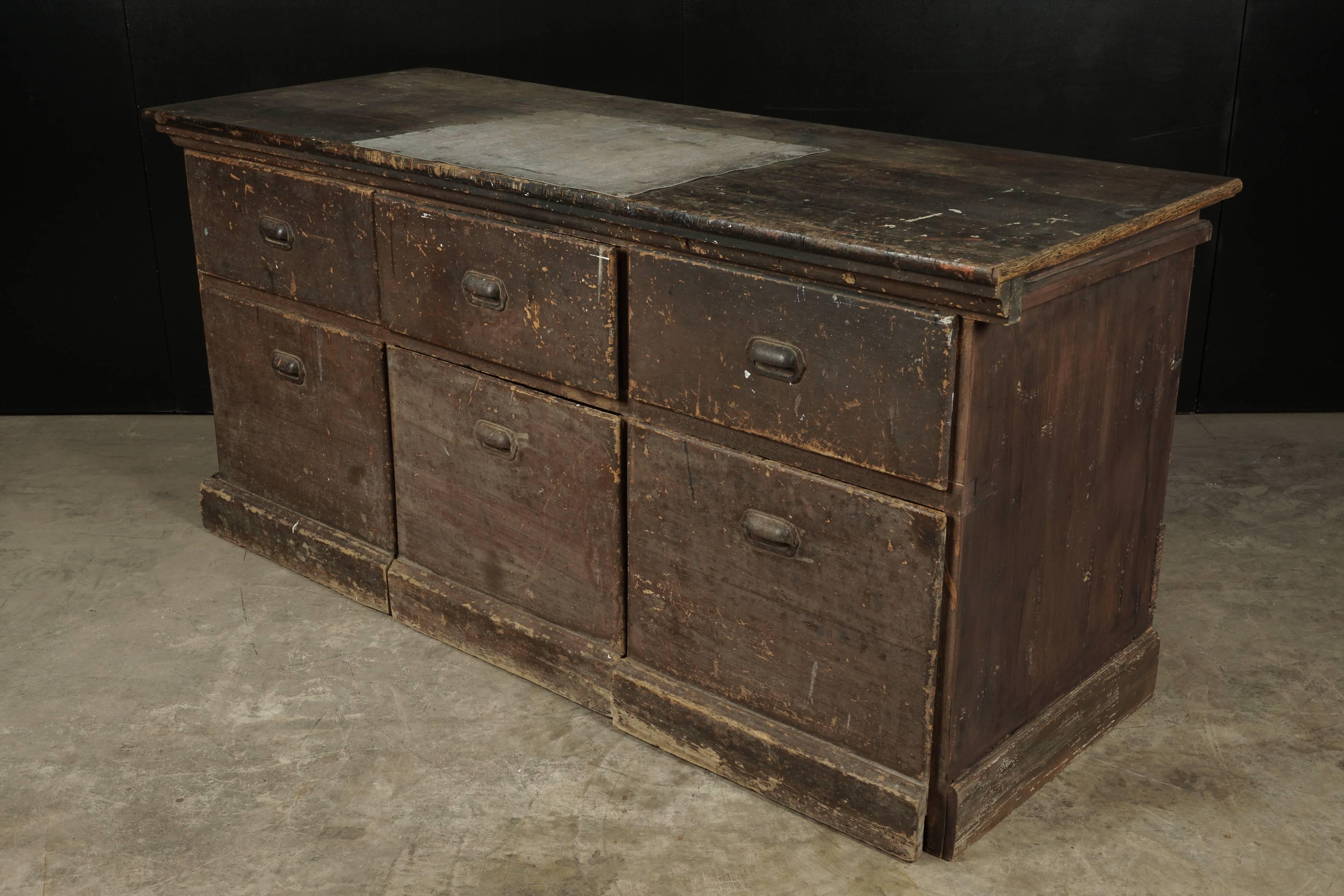 Rare French bakery chest from France, circa 1920. Fantastic original color and patina. Three bottom drawers on casters for easier operation.