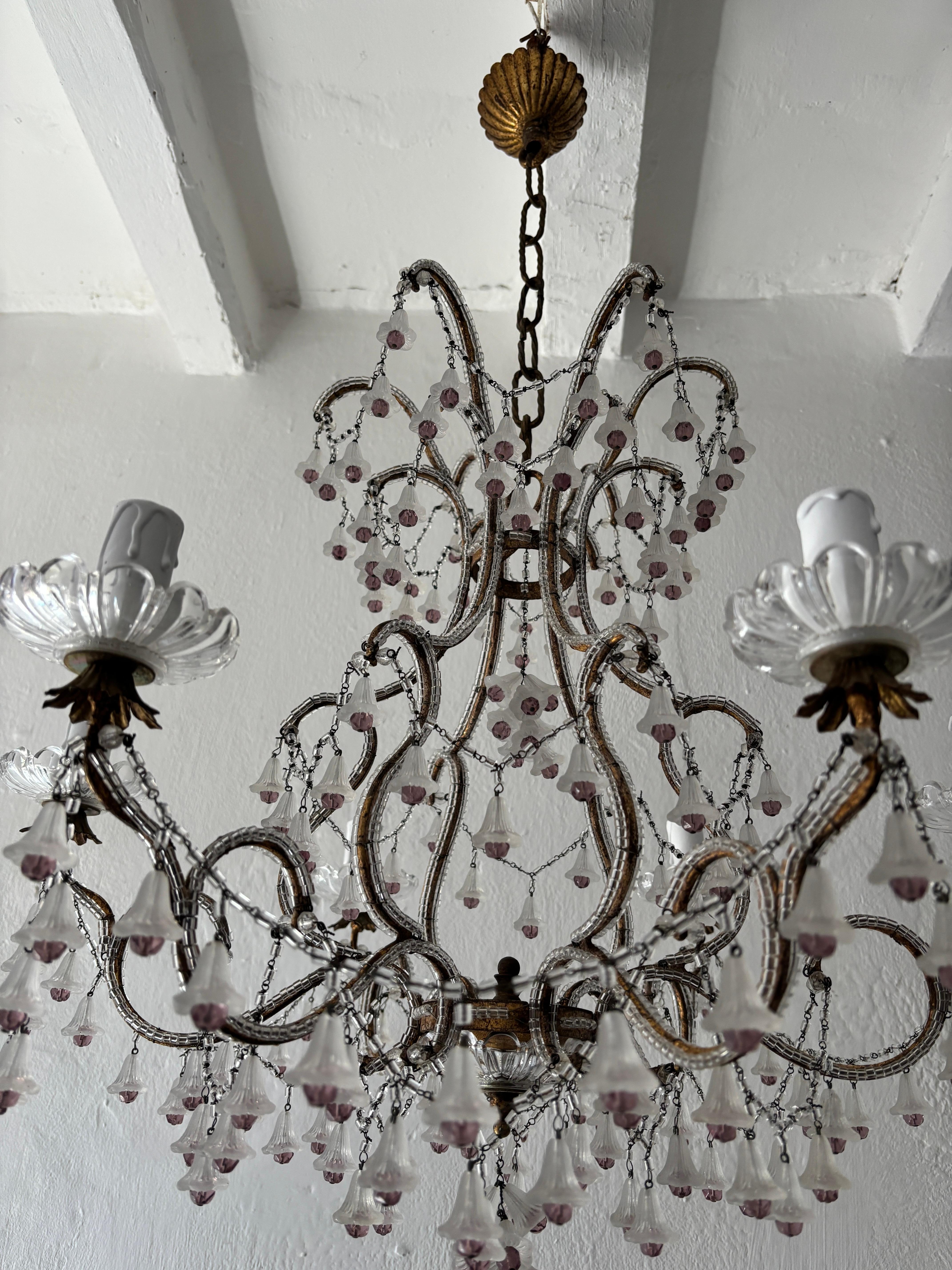 Housing six lights sitting in rare crystal bobeches. Will be rewired with certified UL US sockets for the USA and certified sockets for rest of countries, ready to hang. Macaroni beaded throughout and hand tied swags as well.  Loaded with clear