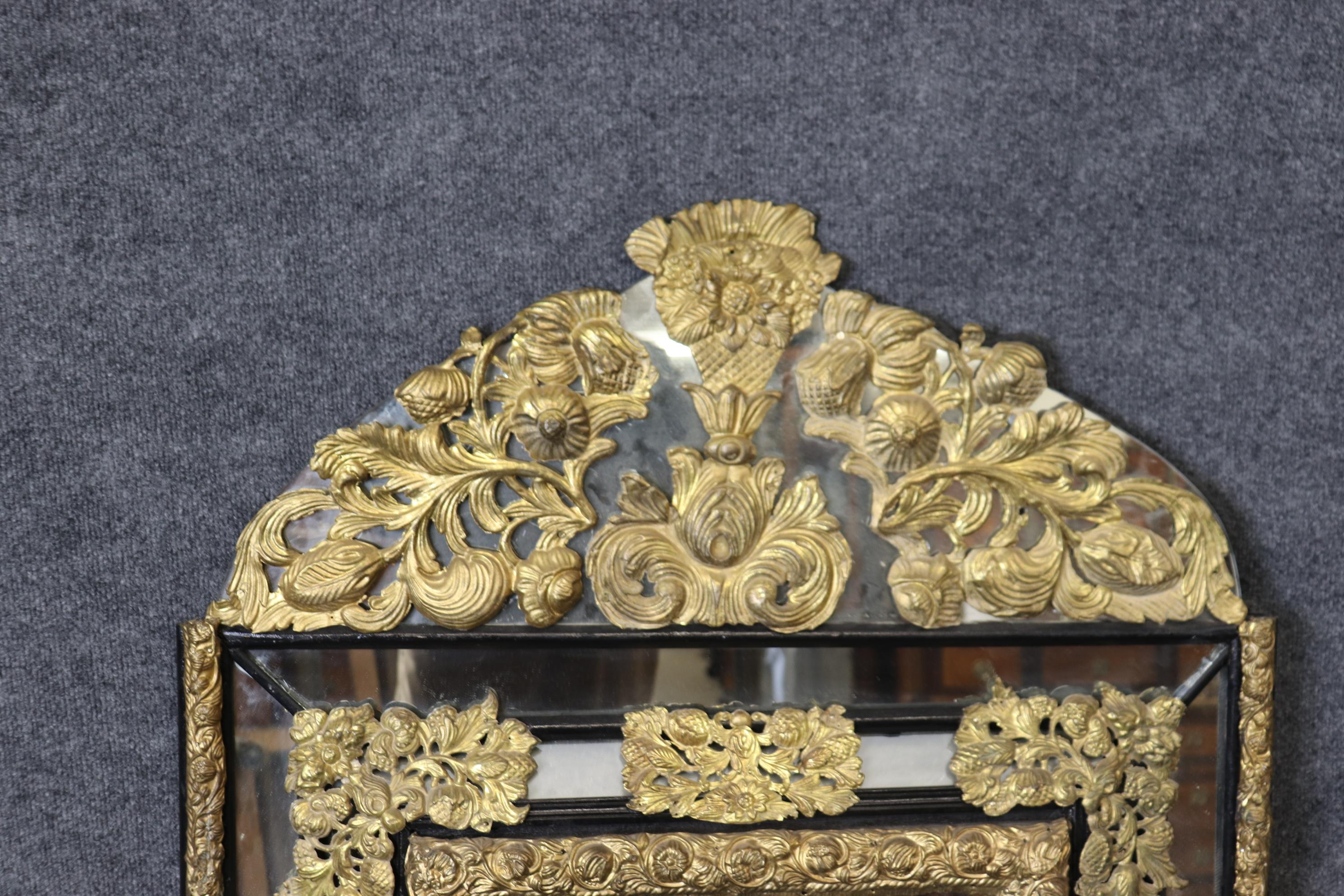 Rare French Brass Repousse Three-Dimensional Cushion Mirror Circa 1920 In Good Condition For Sale In Swedesboro, NJ
