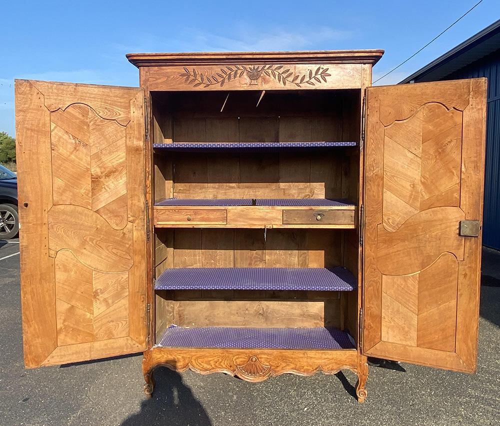 Rare French Country Louis XV Carved Chestnut Armoire with Flowers In Good Condition In Swedesboro, NJ