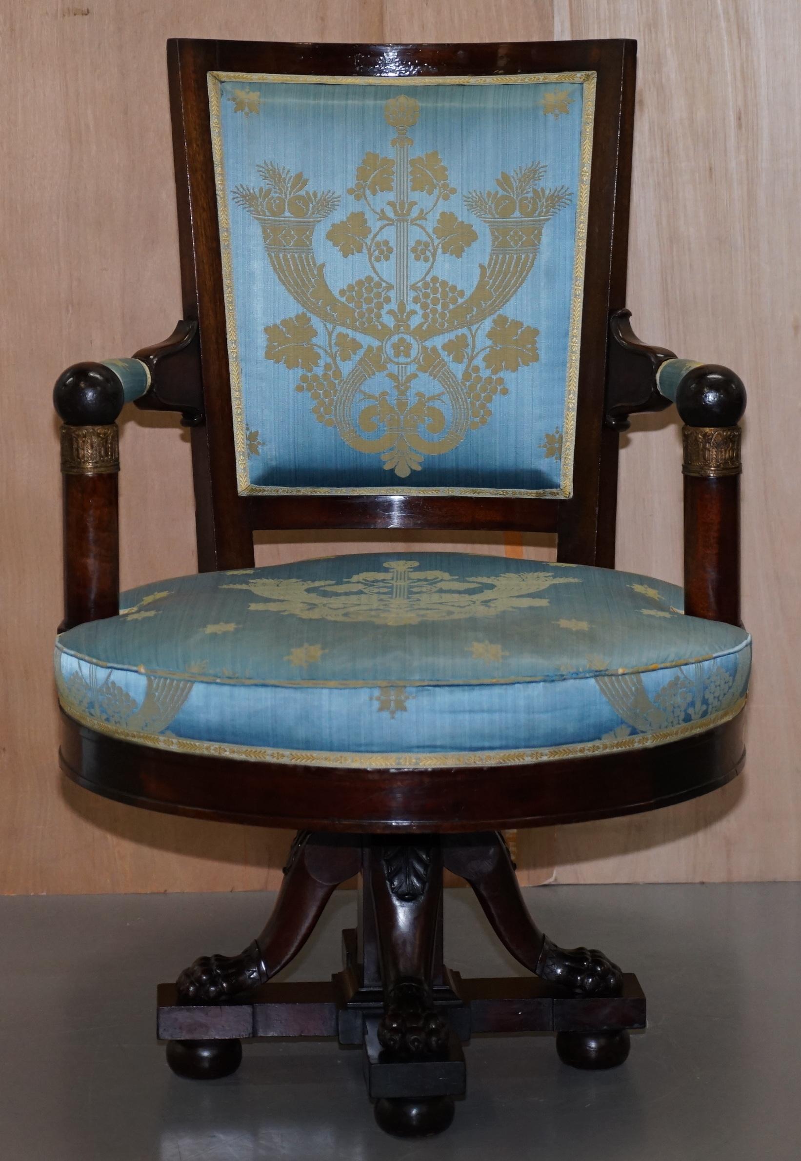We are delighted to offer for sale very rare circa 1800 French Empire Napoleon I heavy solid mahogany swivel chair with Lion paw feet

A rare and good looking well made chair, its very heavy, the fabric looks early, its missing a little piping at