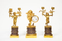 Rare French Gilt-Bronze Ormolu and Porphyry Three-Piece Clock Set, circa 1880