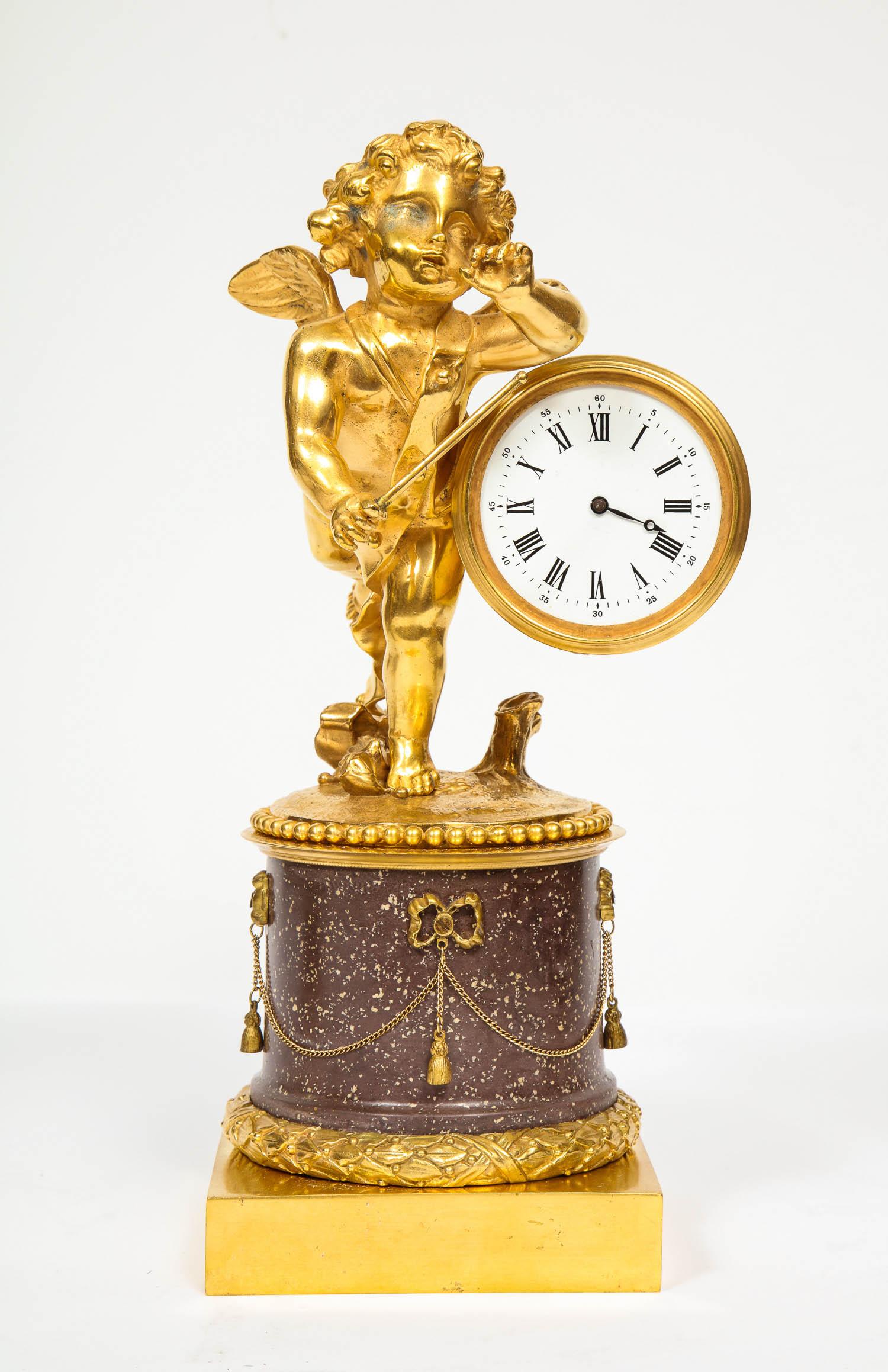 Napoleon III Rare French Gilt-Bronze Ormolu and Porphyry Three-Piece Clock Set, circa 1880