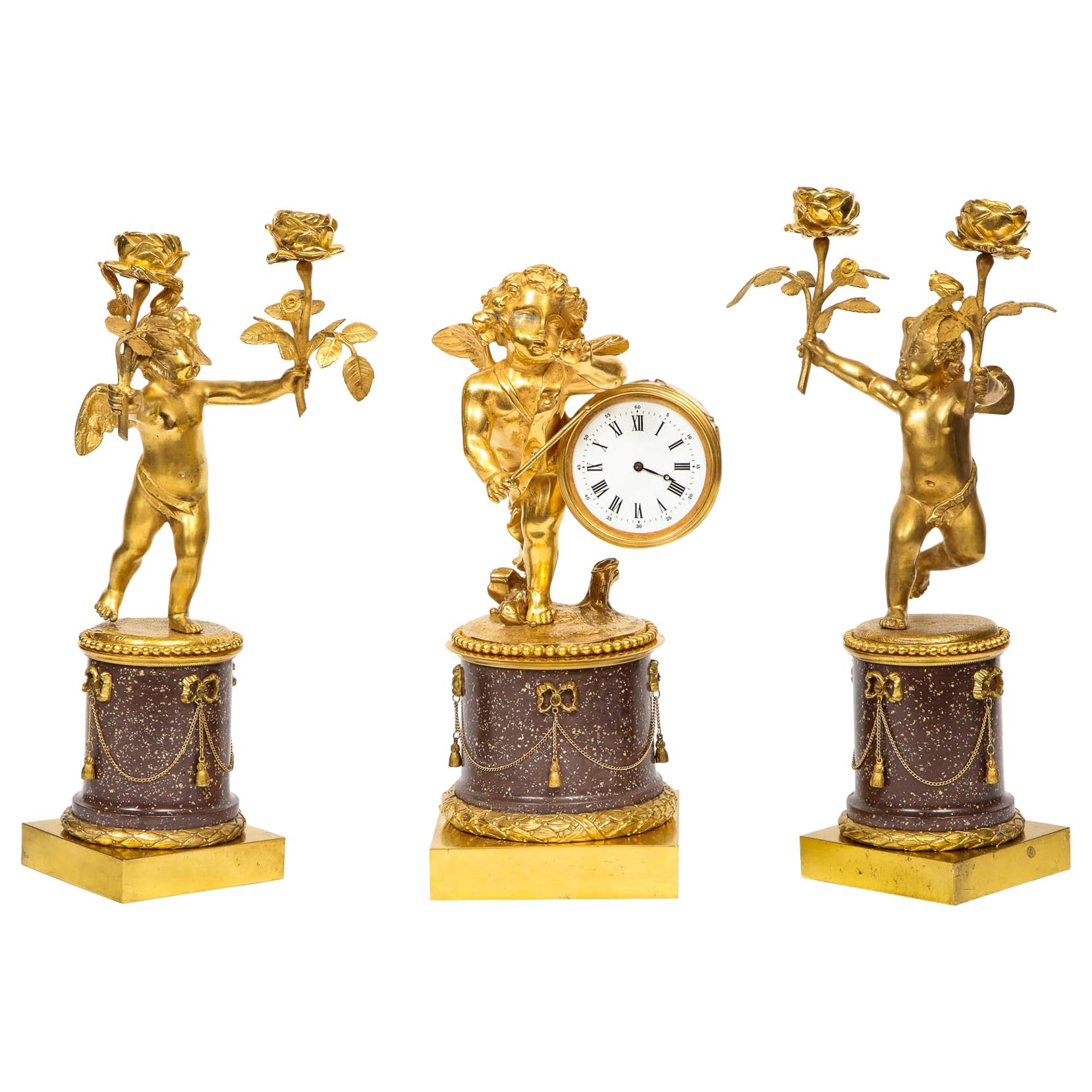 Rare French Gilt-Bronze Ormolu and Porphyry Three-Piece Clock Set, circa 1880