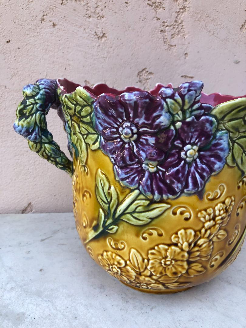 Rare French Majolica cachepot with purple flowers signed Onnaing, circa 1890.