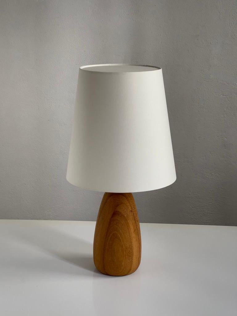 Brass Rare French modern table Lamp carved from Solid Elm Tree with bordeaux top part. For Sale