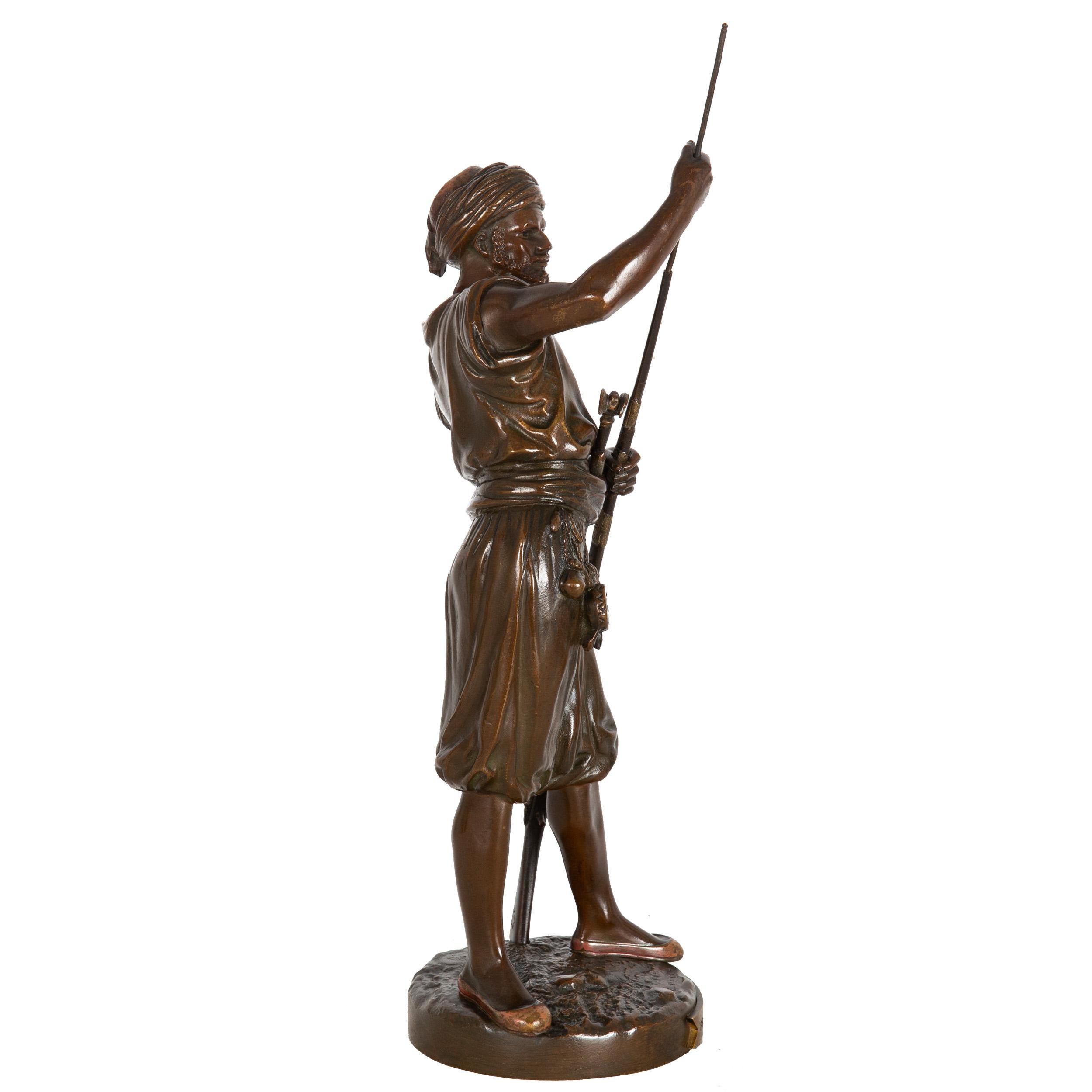 JEAN-DIDIER DEBUT
French, 1824-1893

French Orientalist Model of a Janissaire Warrior

Polychromed and patinated bronze  signed 