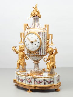 Rare French porcelain and gilt bronze mantel clock by Godon